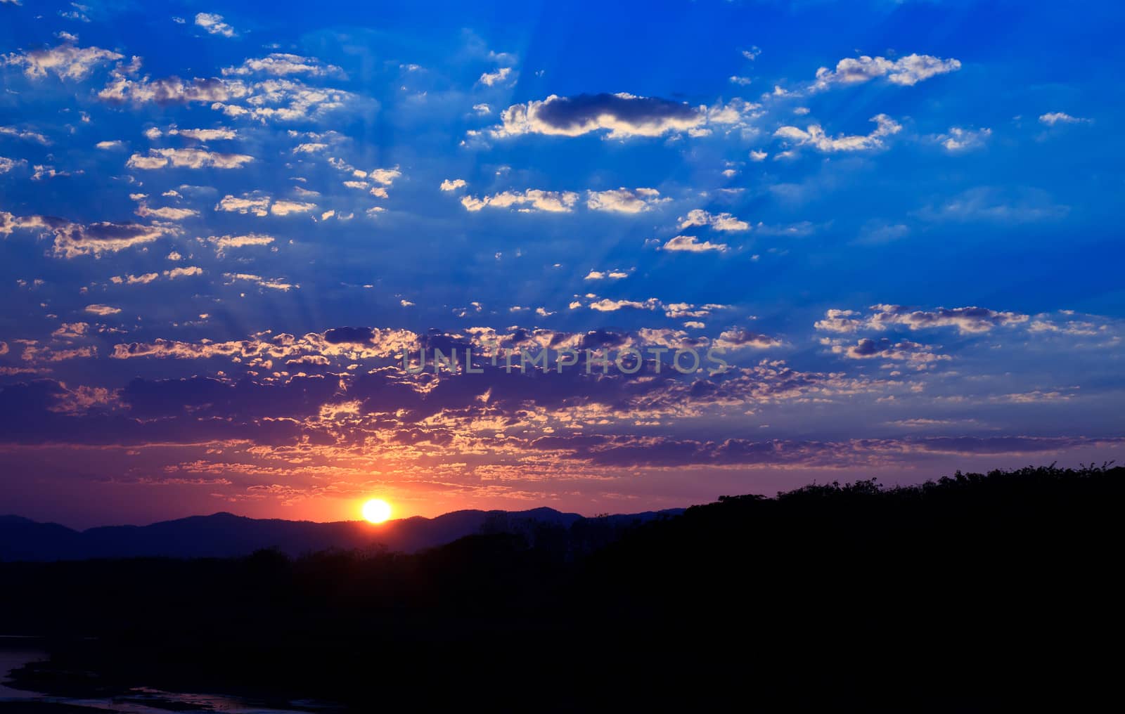 Sky background on sunset.  by den_rutchapong