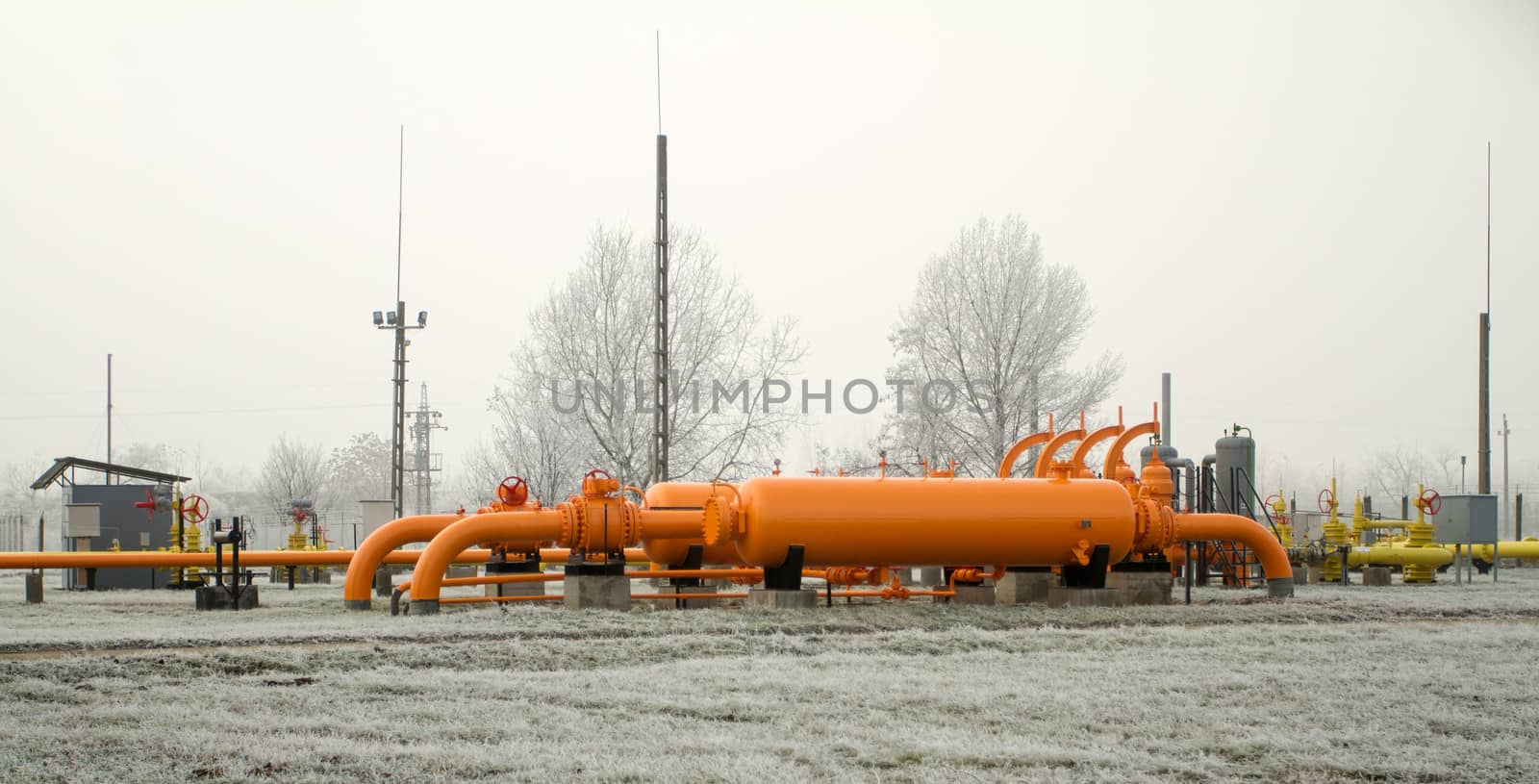 orange gas pipe in frosted winter