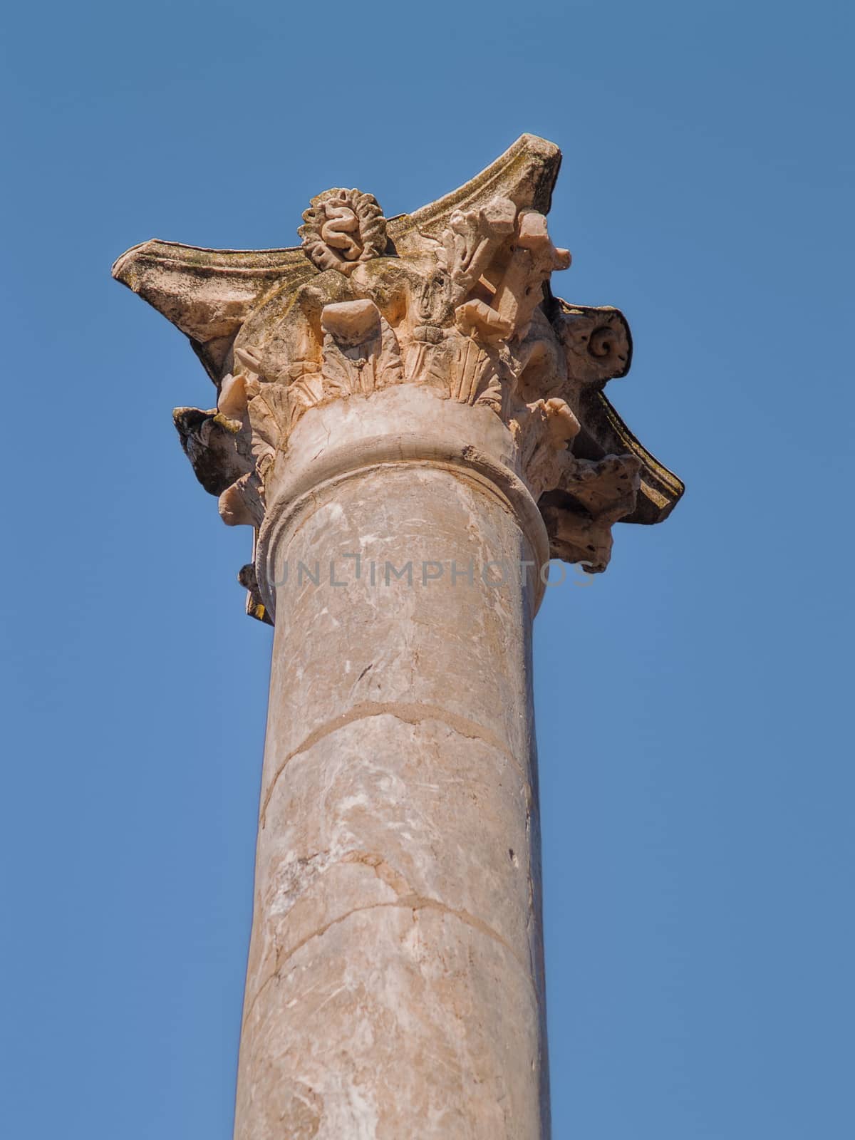 Merida, November 2012. Roman Theater ruins in Merida, capital of Extremadura region in Spain. Year 16 - 15 B.C.  Nowadays in use for performances. Archeological site UNESCO World Heritage Site. Column capital