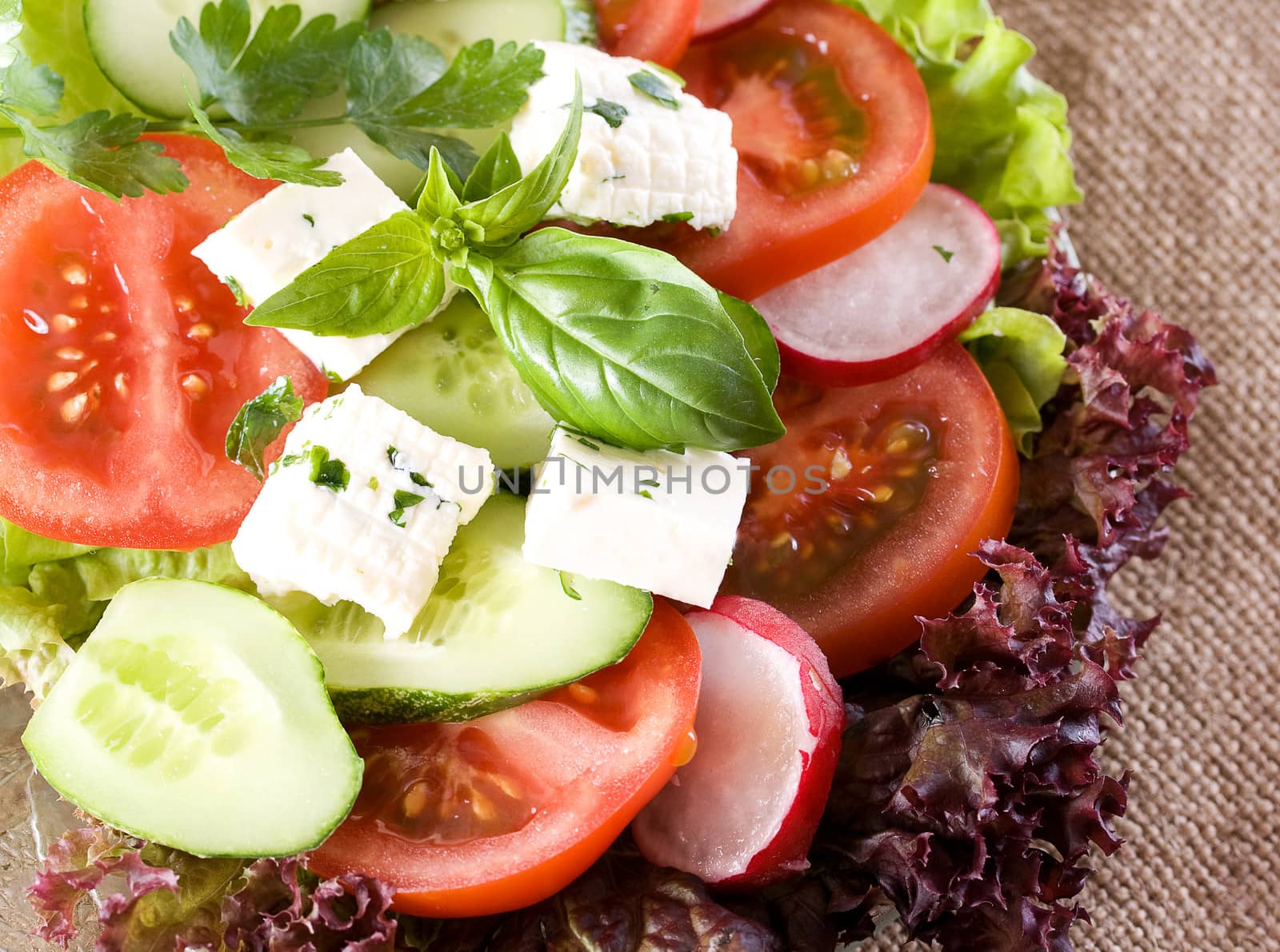 Healthy dinner salad with lots of greens.