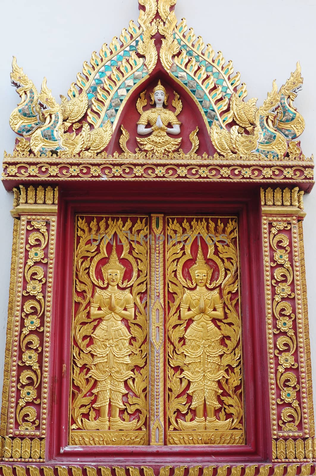 Historic Thai temple window in Chiang Mai, Thailand