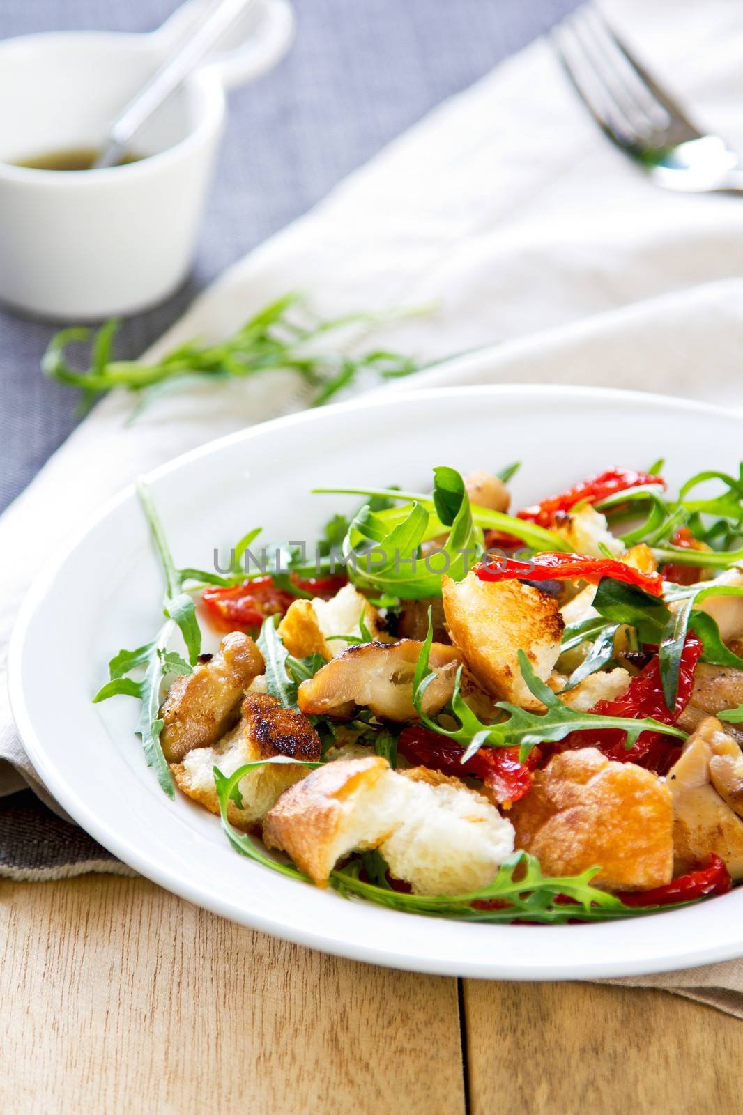 Chicken with sun dried tomato ,rocket and crouton salad