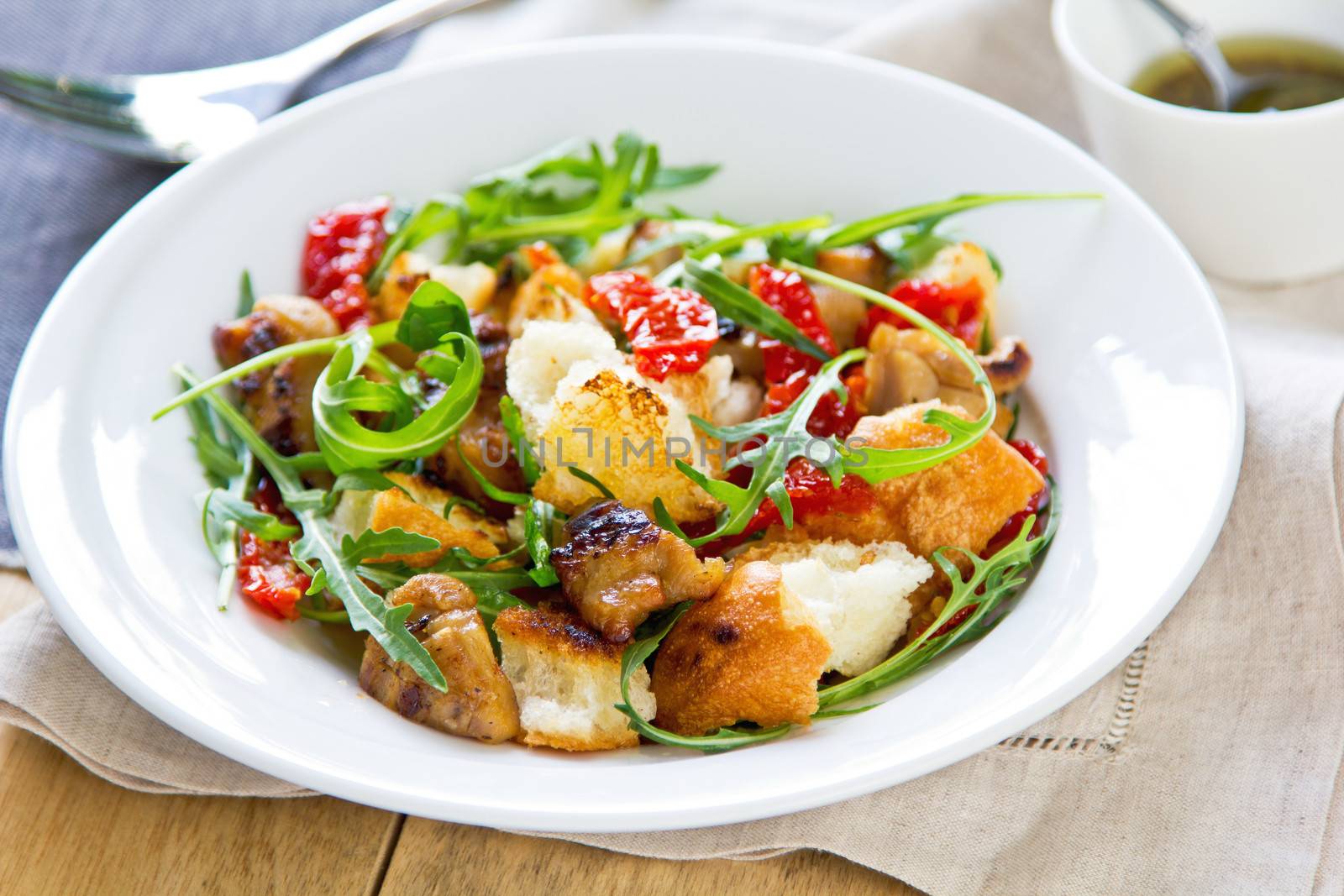 Chicken with sun dried tomato ,rocket and crouton salad