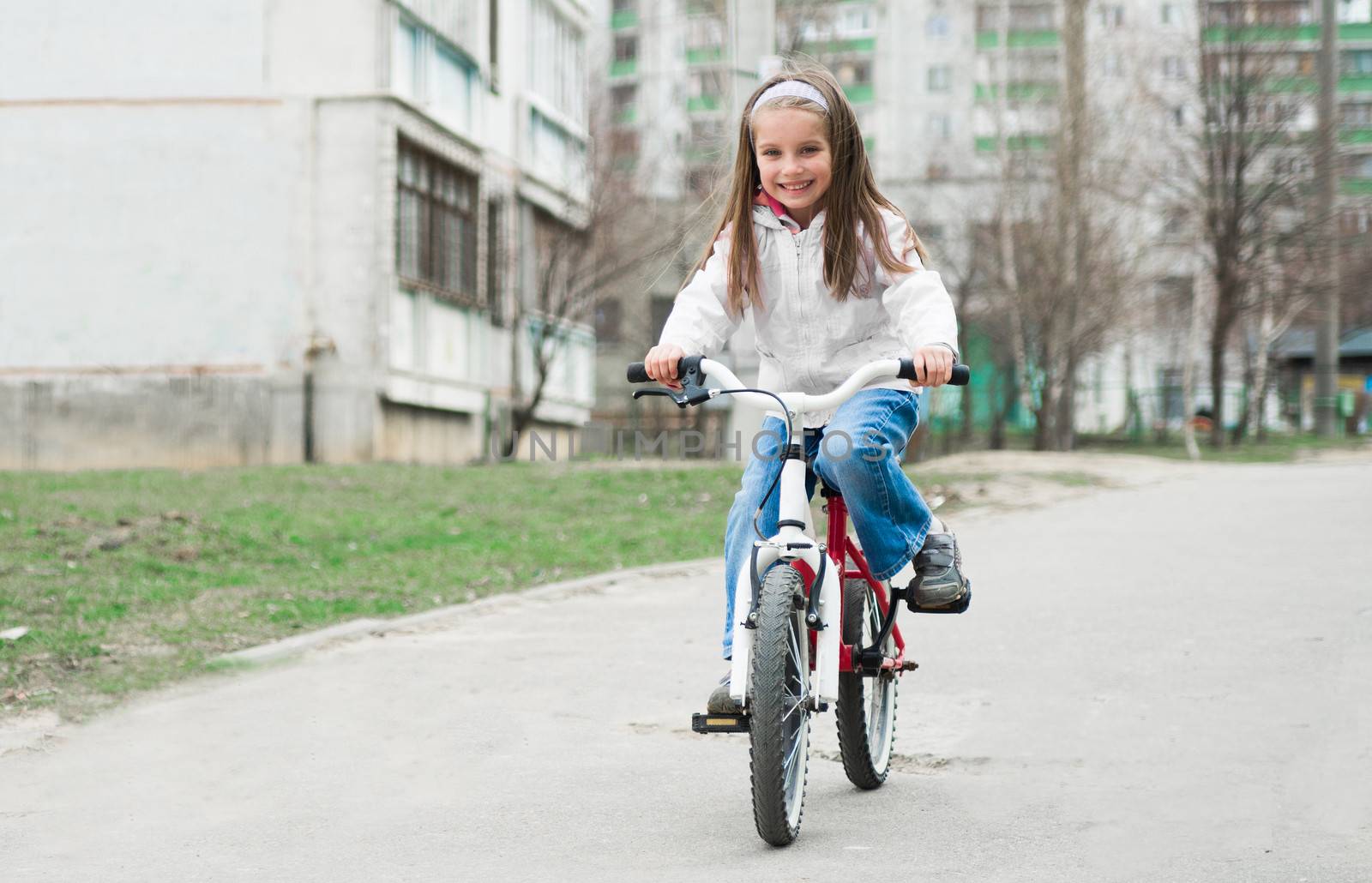 little girl with her bicycle by GekaSkr