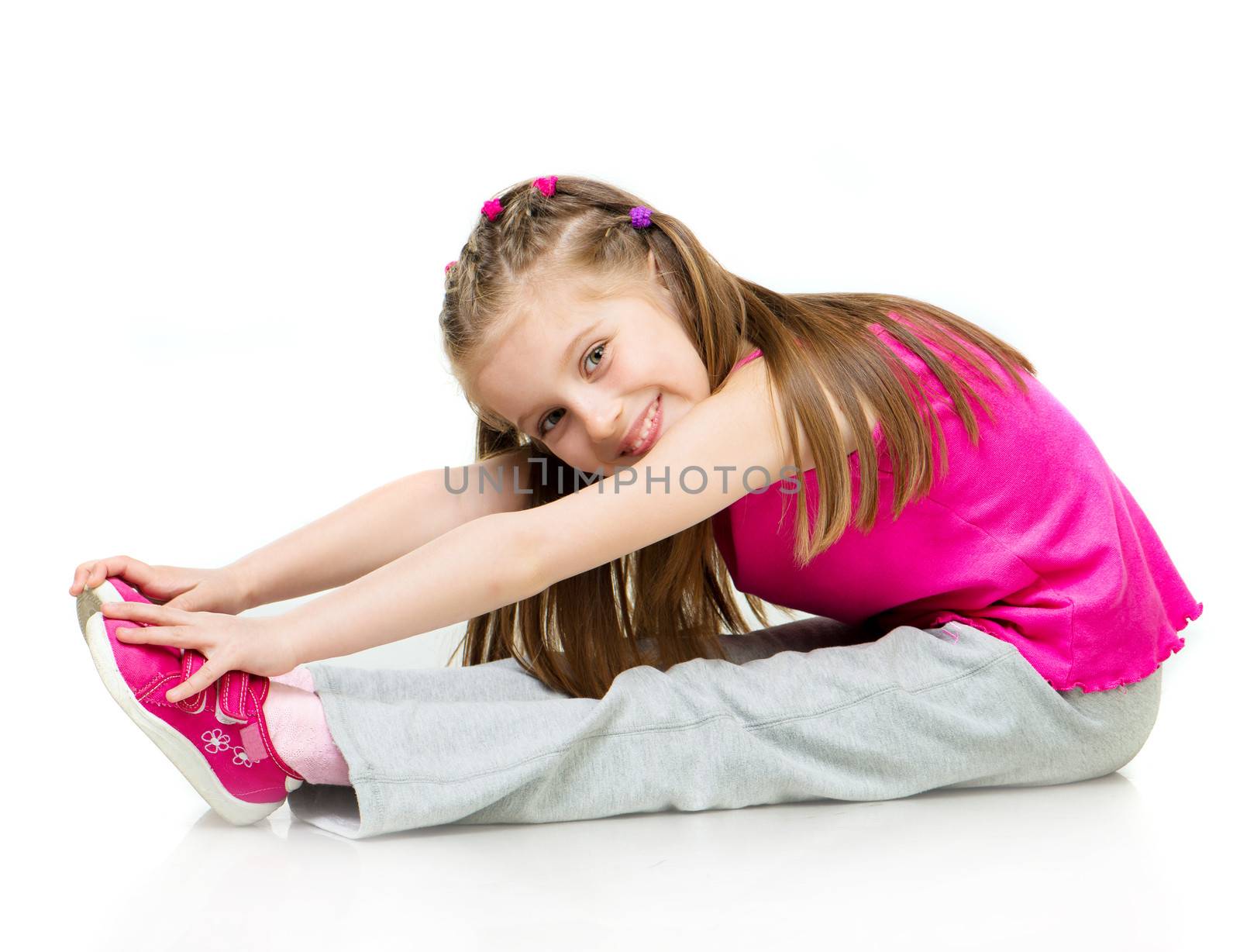 young girl gymnast over white background