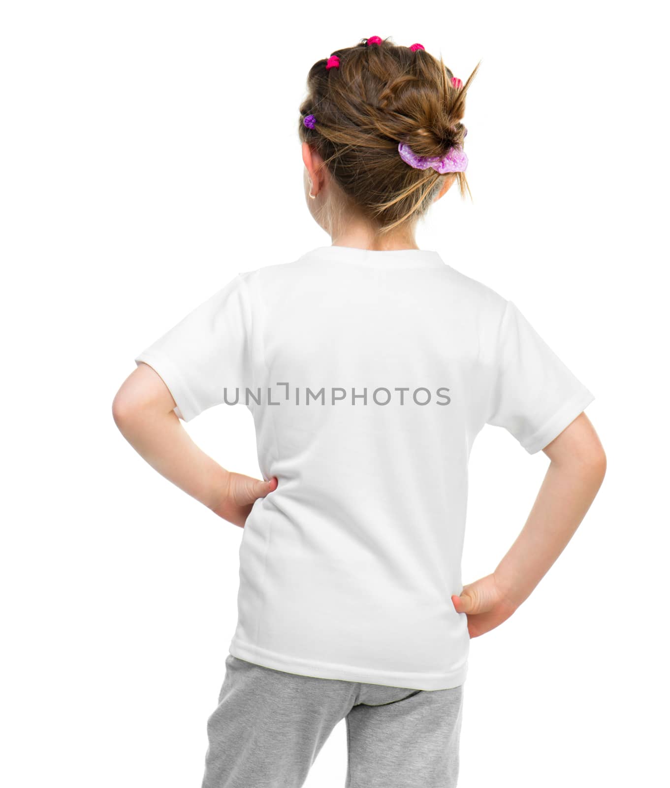 little girl in white t-shirt (back) isolated on a white background