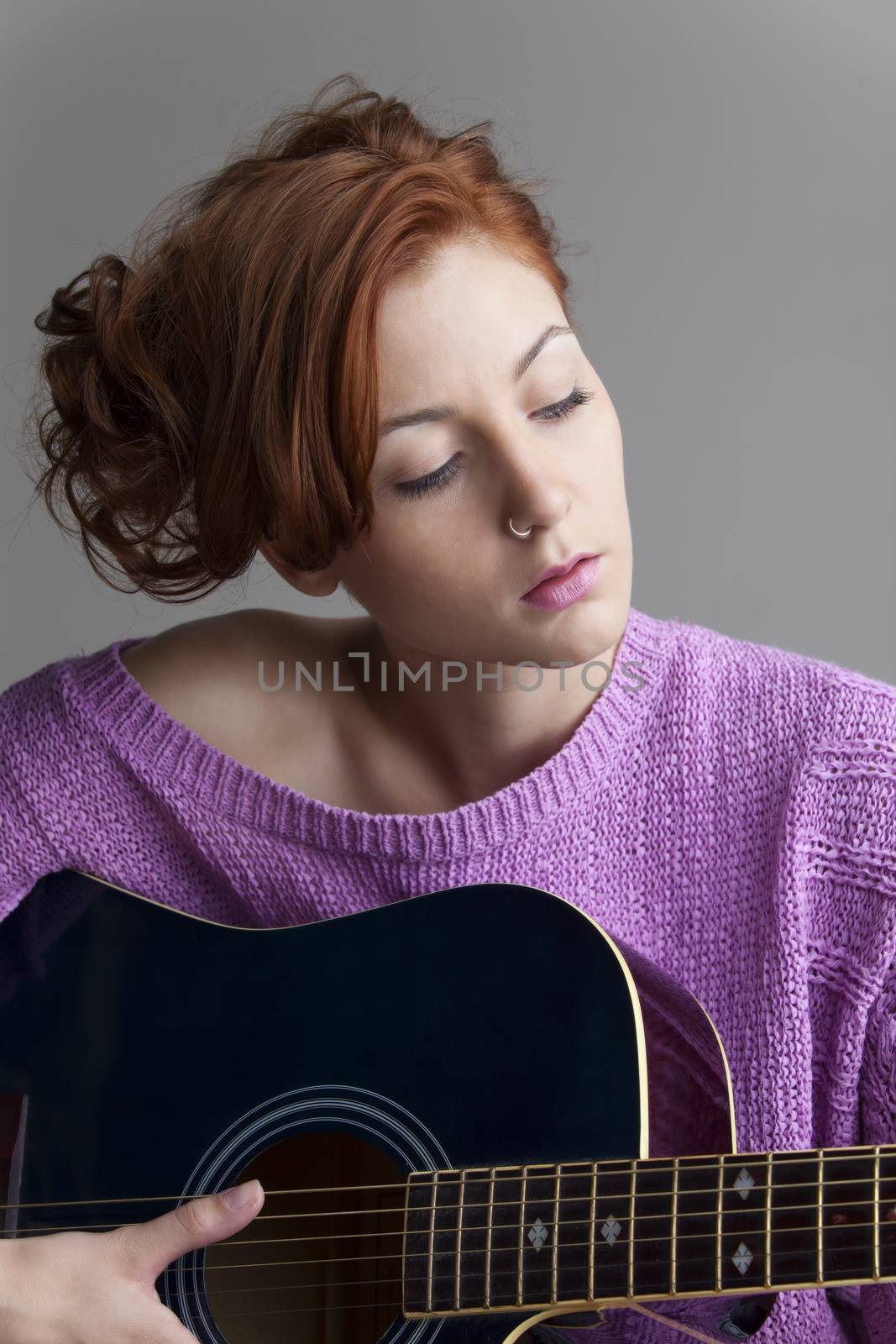 redhead with a guitar by bernjuer