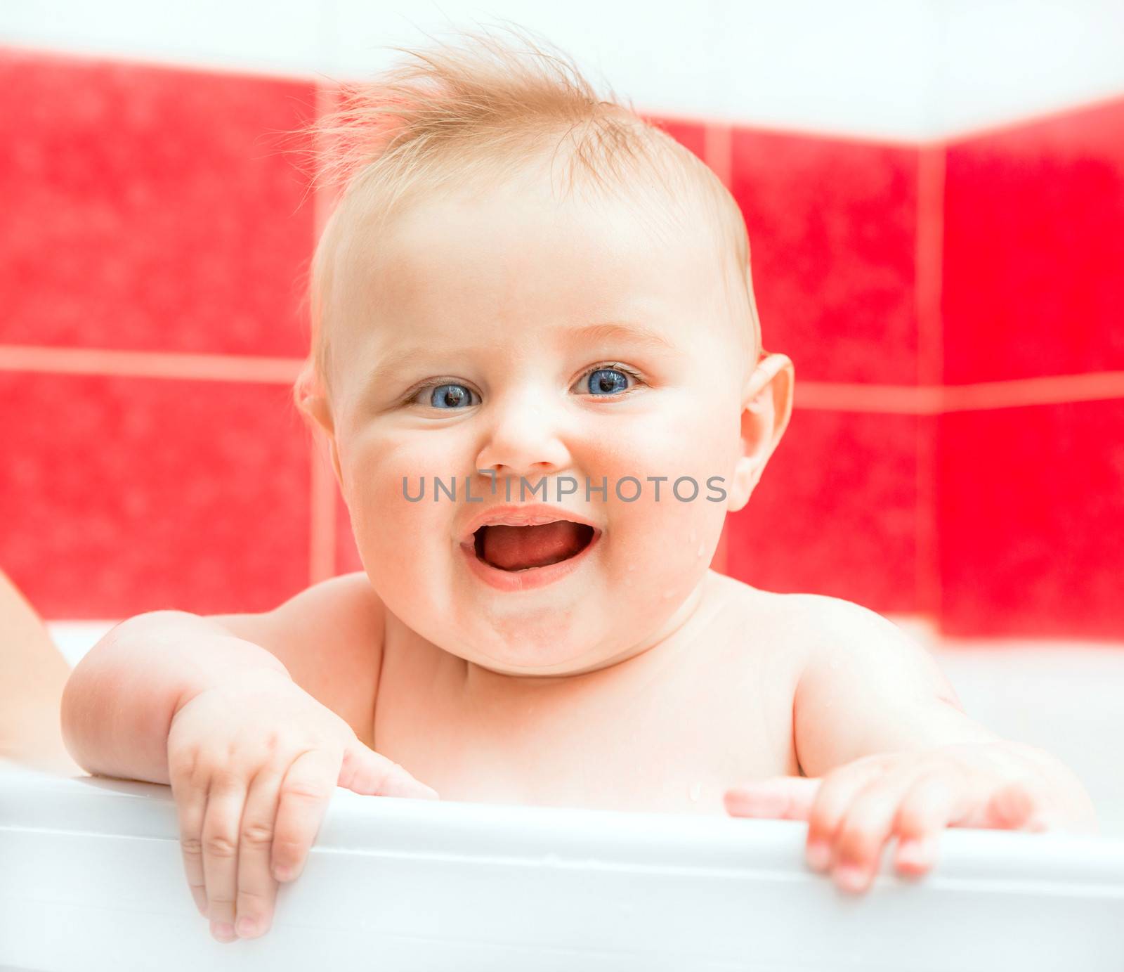 cute smiling baby girl in bath