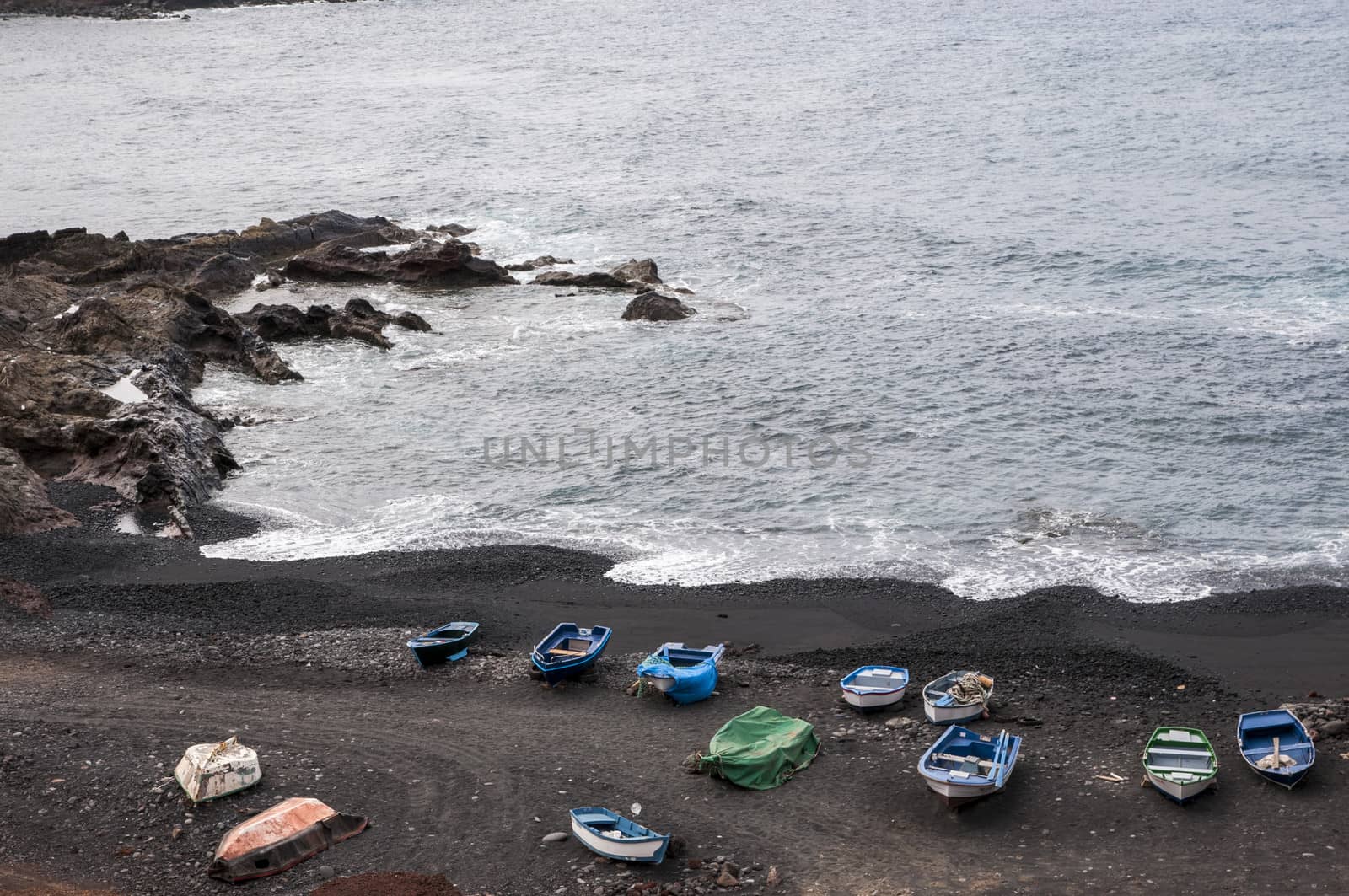 Lanzarote beach full of boats of all colors