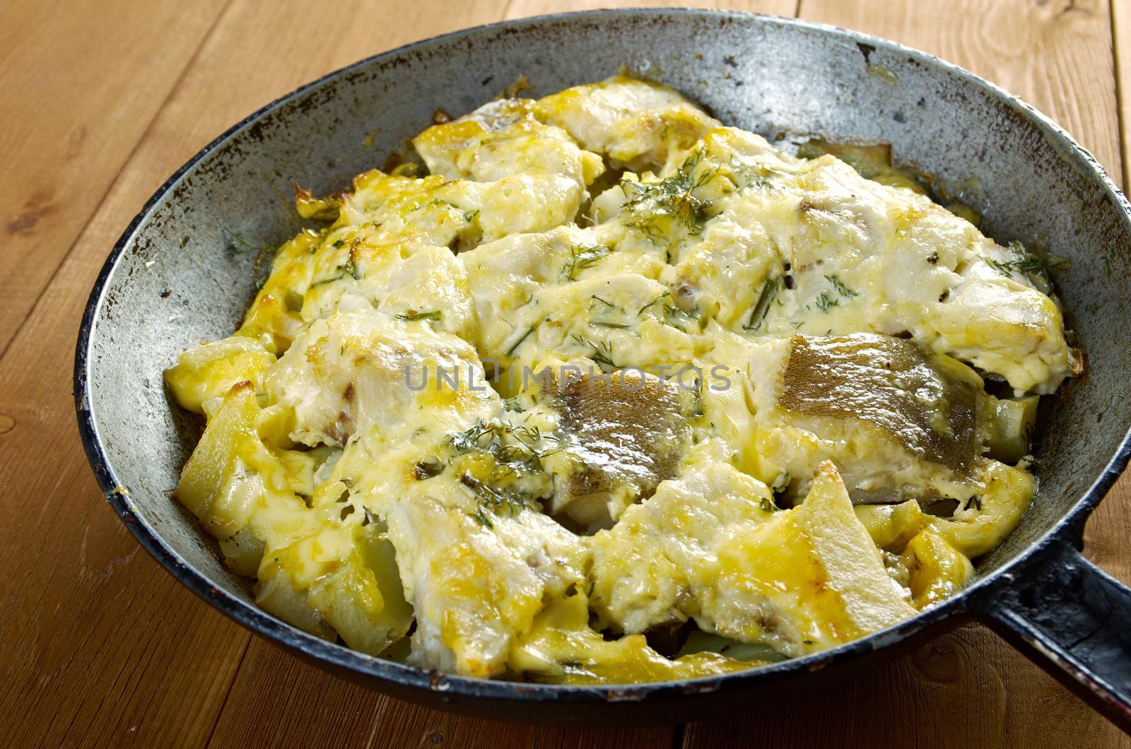 	farm-style 	country Codfish with potatoes and onions baked