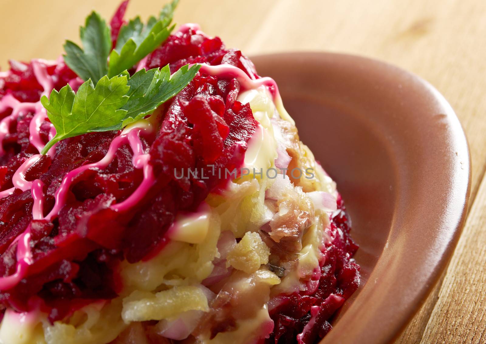 traditional russian salad with salted herring and beet -Selyodka Pod Shuboy (Dressed Herring)
