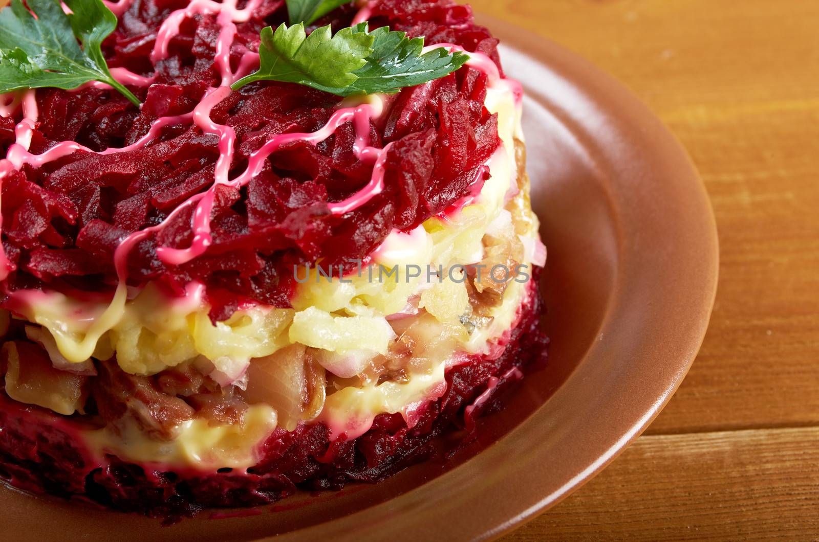 traditional russian salad with salted herring and beet -Selyodka Pod Shuboy (Dressed Herring)
