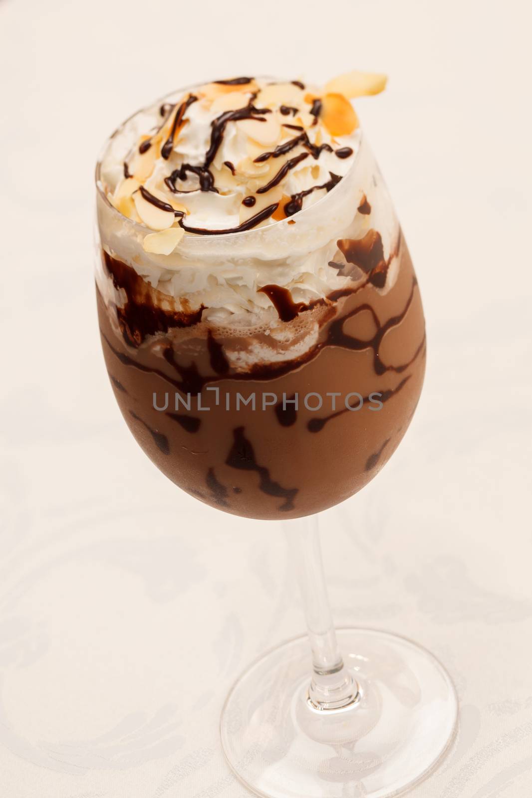 cold fresh ice coffee with chocolate close up  by shebeko