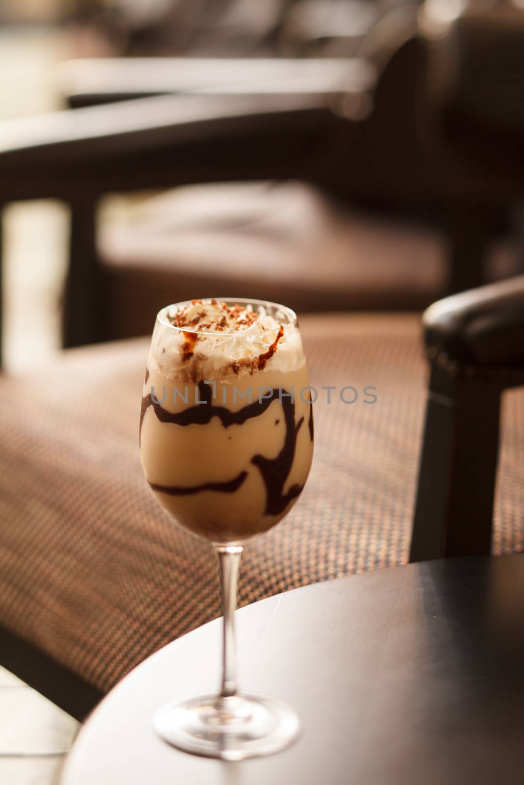 cold fresh ice coffee with chocolate close up  by shebeko