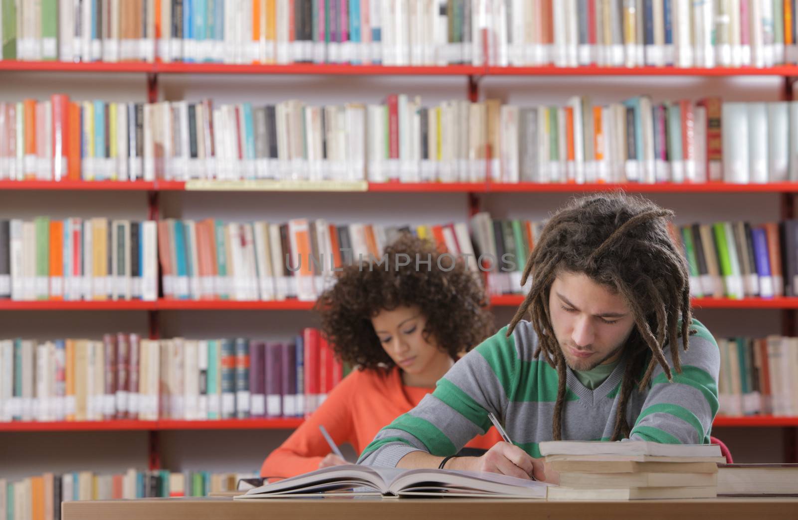 Two students in a library