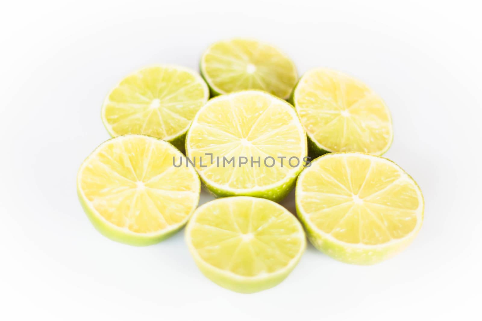 Fresh citrus lime slice on white background