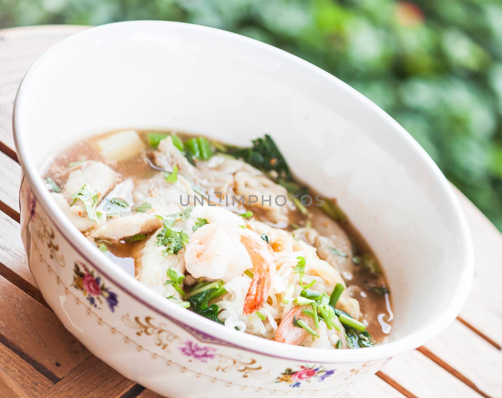 Thai noodles  with pork and shrimp in spicy soup by punsayaporn