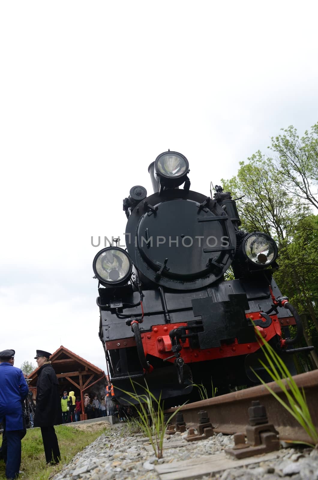 KROSNICE, DOLNY SLASK, POLAND - MAY 25: Restored narrow gauge railroad in Krosnice. Front of old locomotive before the first trip on 25 May 2013 in Krosnice, Poland.