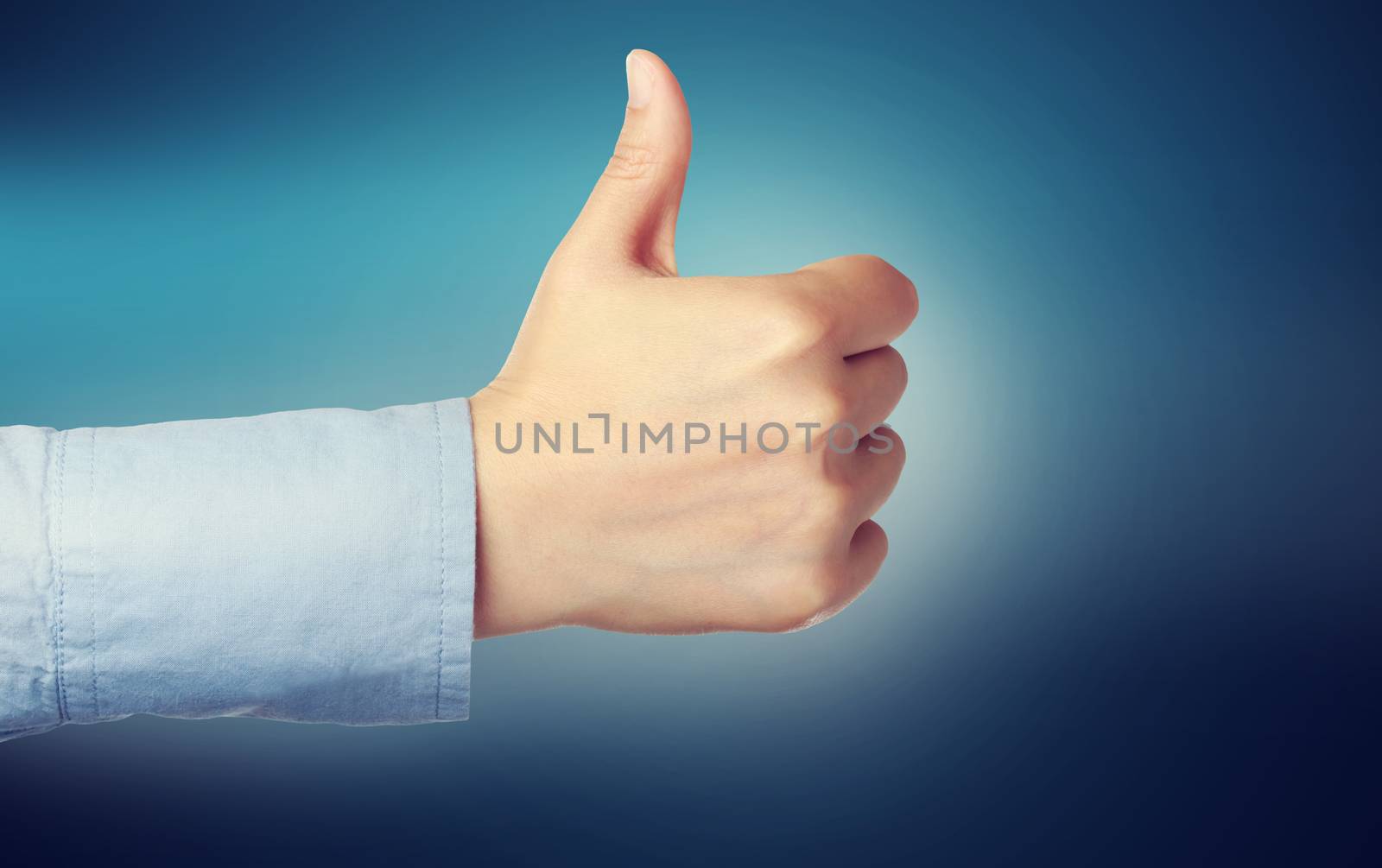 Person giving the thumbs up over blue background