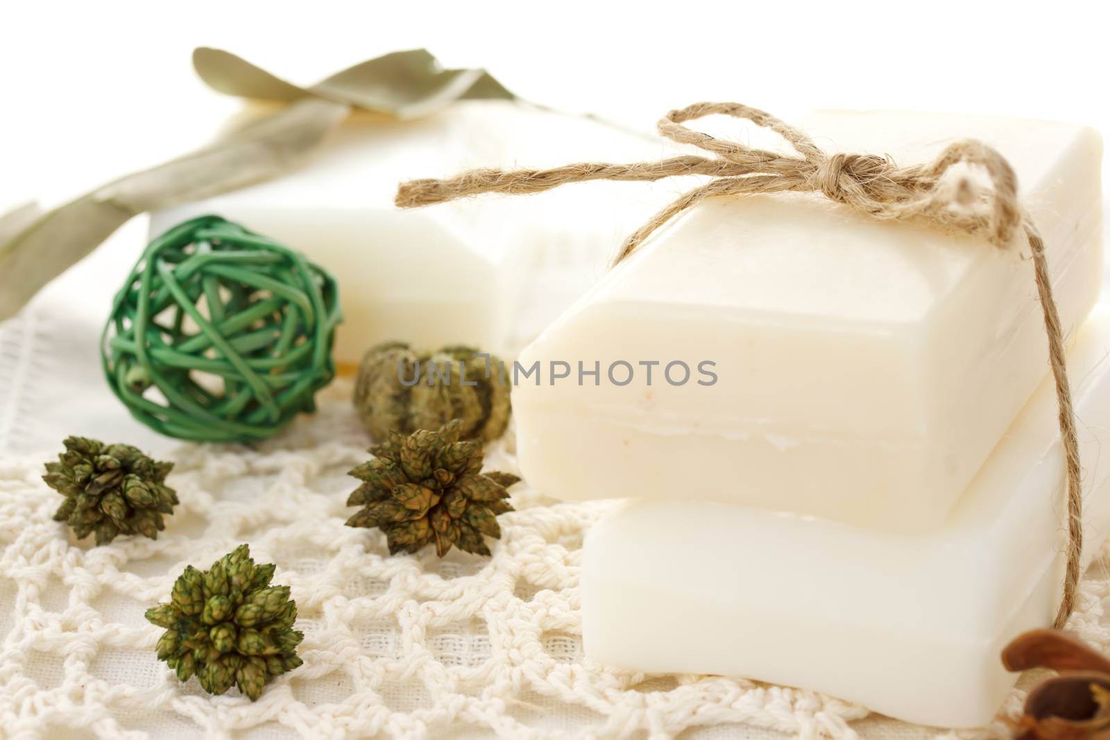 Bars of soap with green potpourris