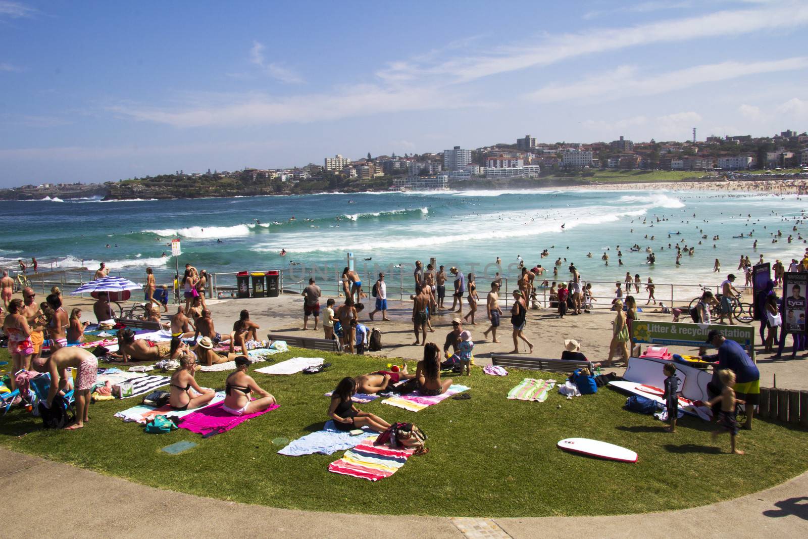 NORTH BONDI BEACH, AUSTRALIA - Mar 16TH: People relaxing on the beach on March 16th 2013. Bondi is one of the most famous beaches in the world.