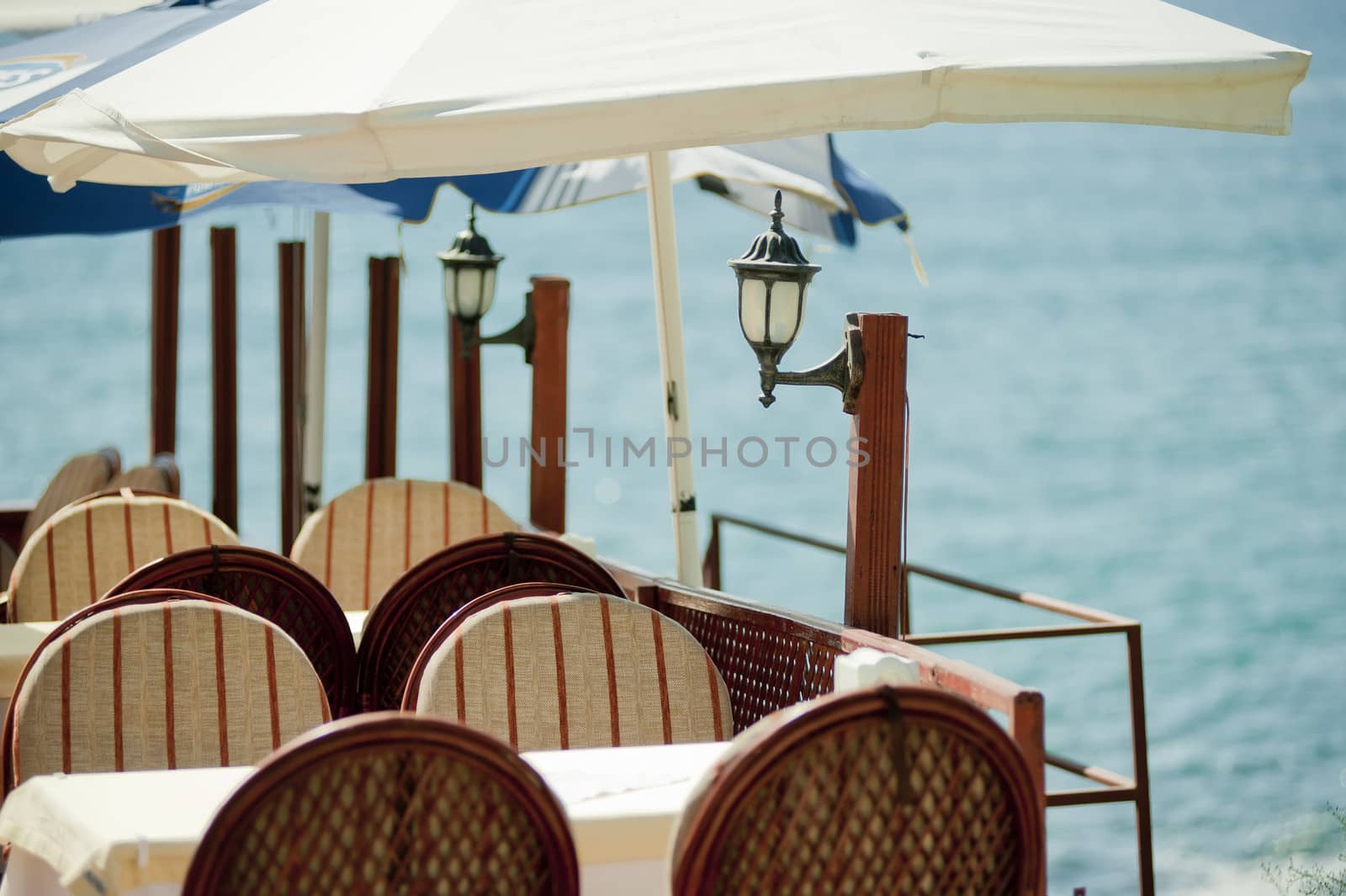 Table in a restaurant by the sea.