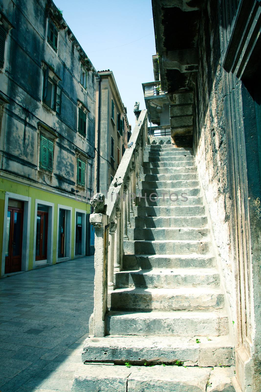 Old house stairway in city of Zadar, Dalmatia, Croatia by motorolka