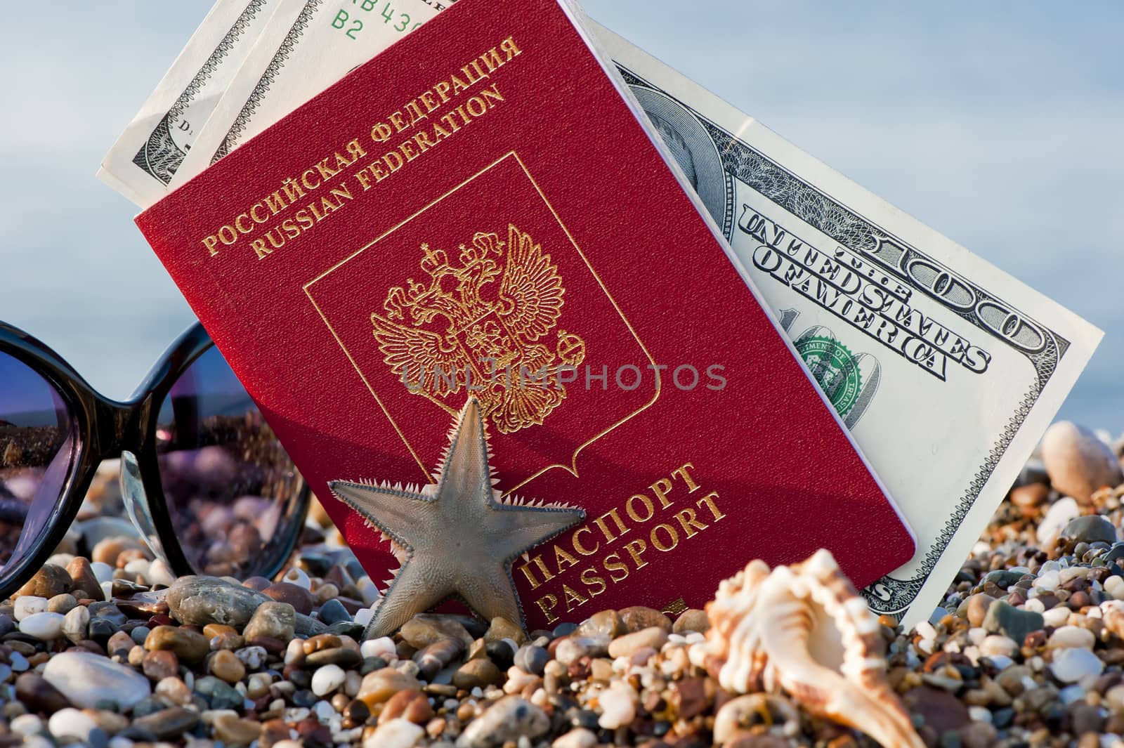 Still traveling with a Russian passport in the sand on the beach