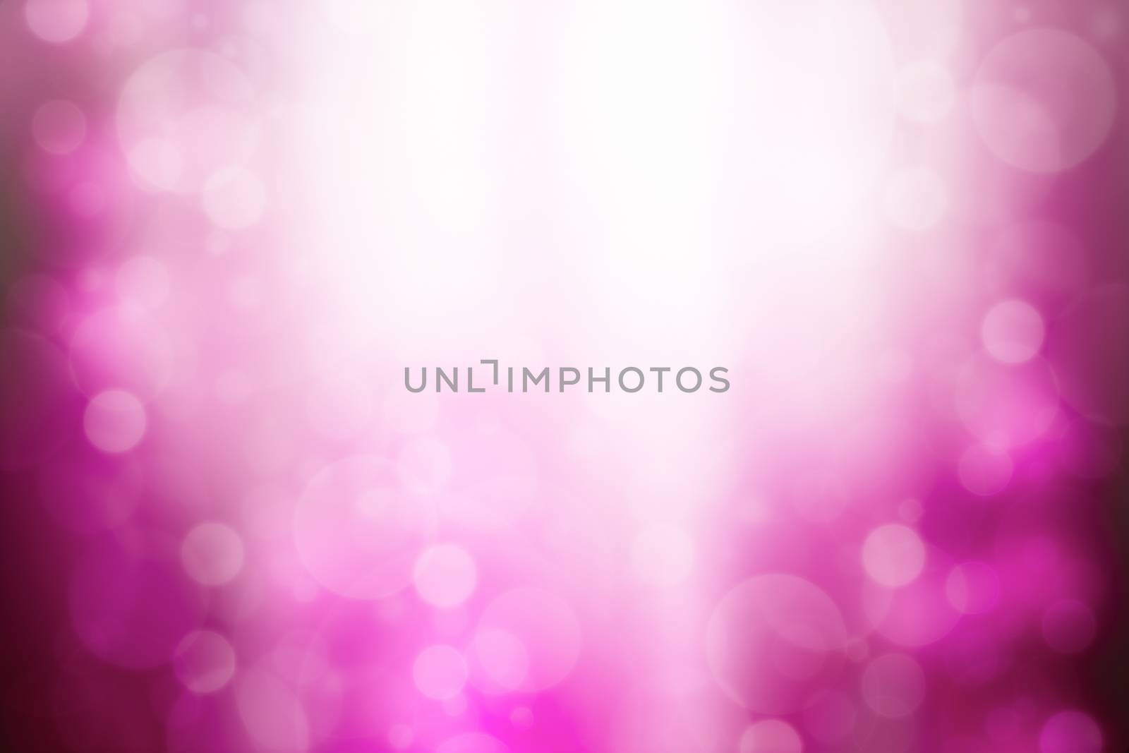 Pink abstract background with bokeh and sun rays