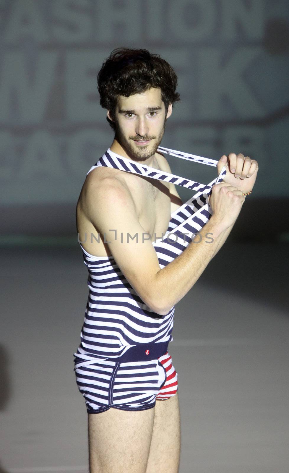 ZAGREB, CROATIA - May 10: Fashion model wears clothes made by Toni Rico on "ZAGREB FASHION WEEK" show on May 10, 2013 in Zagreb, Croatia.