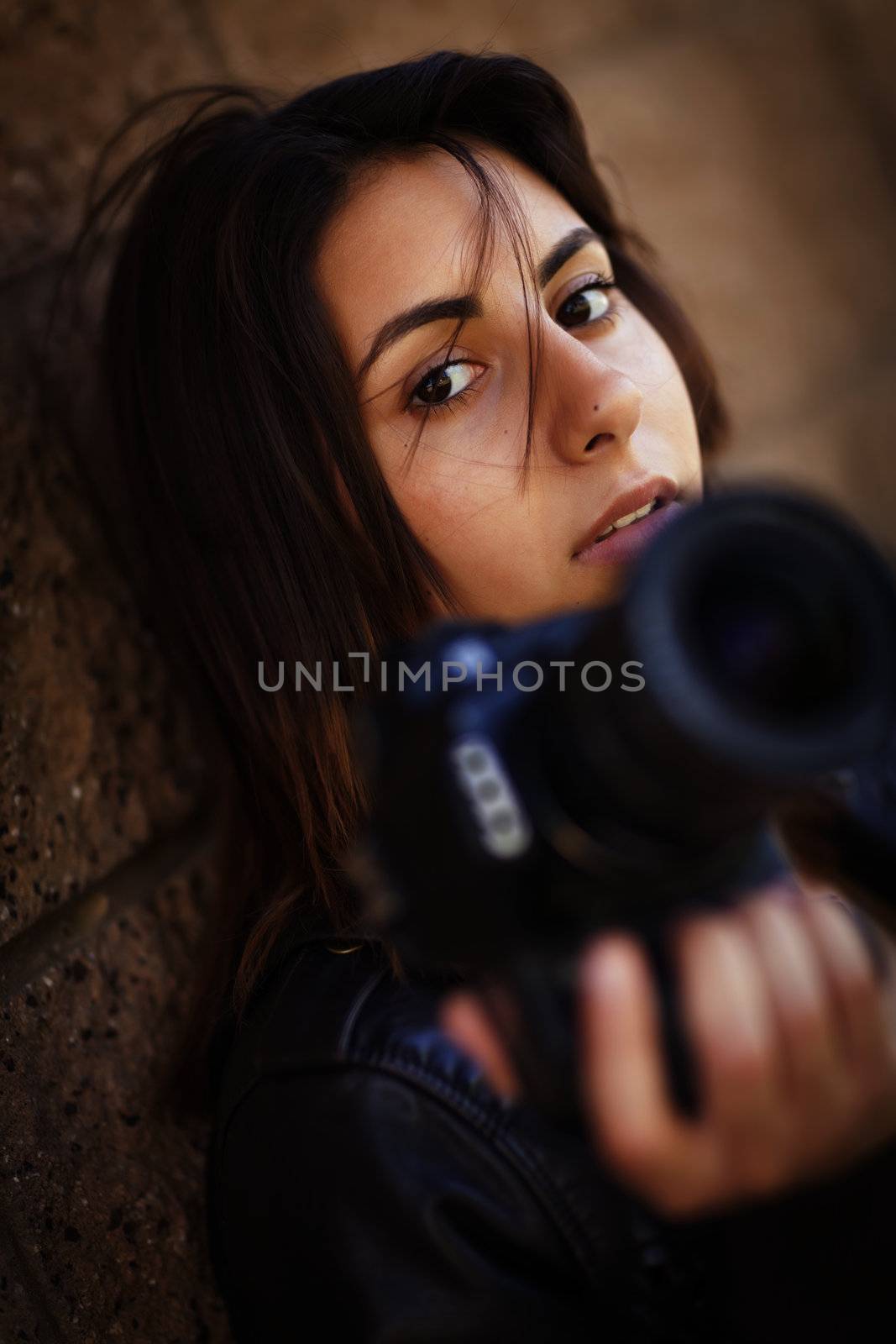 Mixed Race Young Adult Female Photographer Holding Camera by Feverpitched