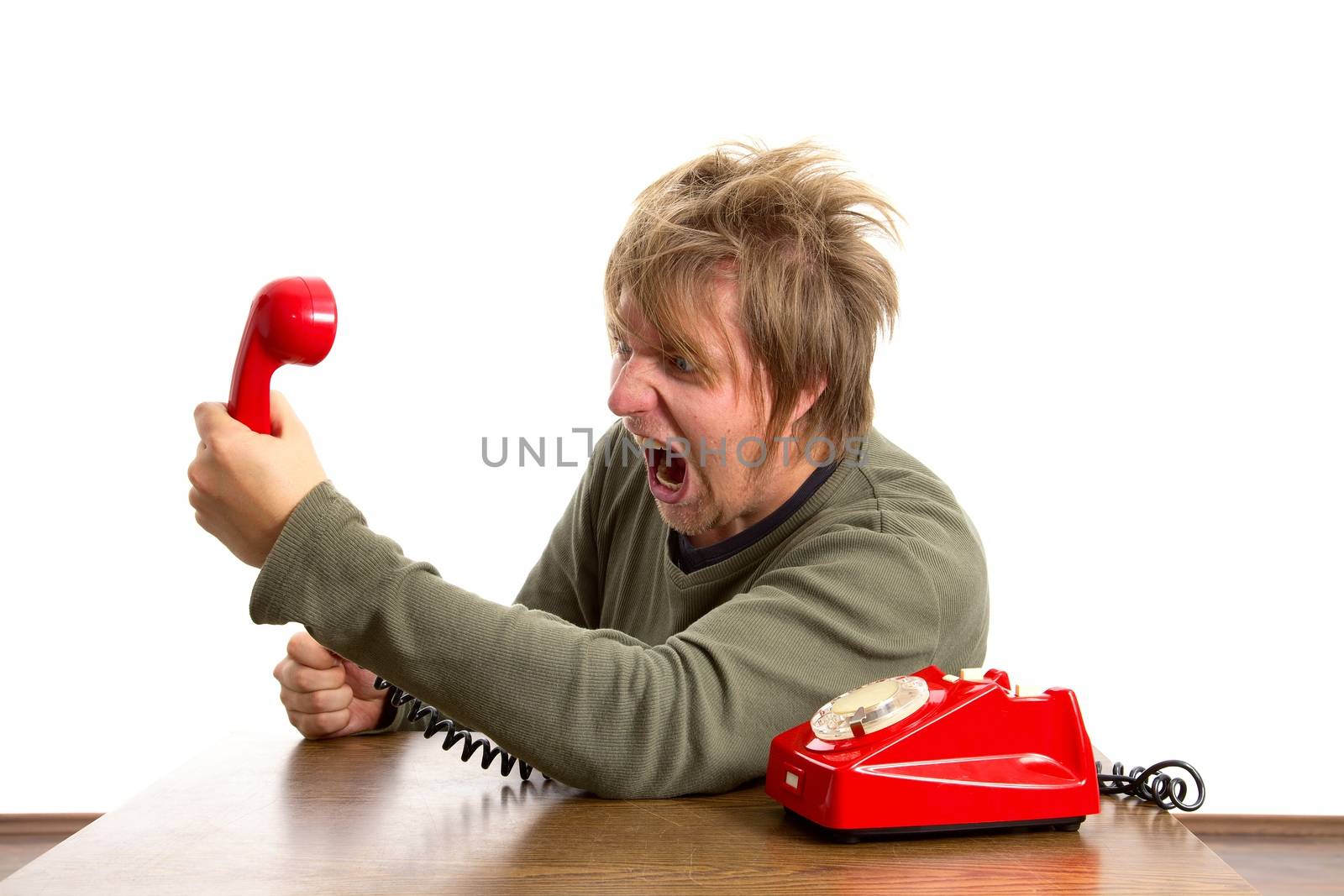 Angry man shouting on the phone