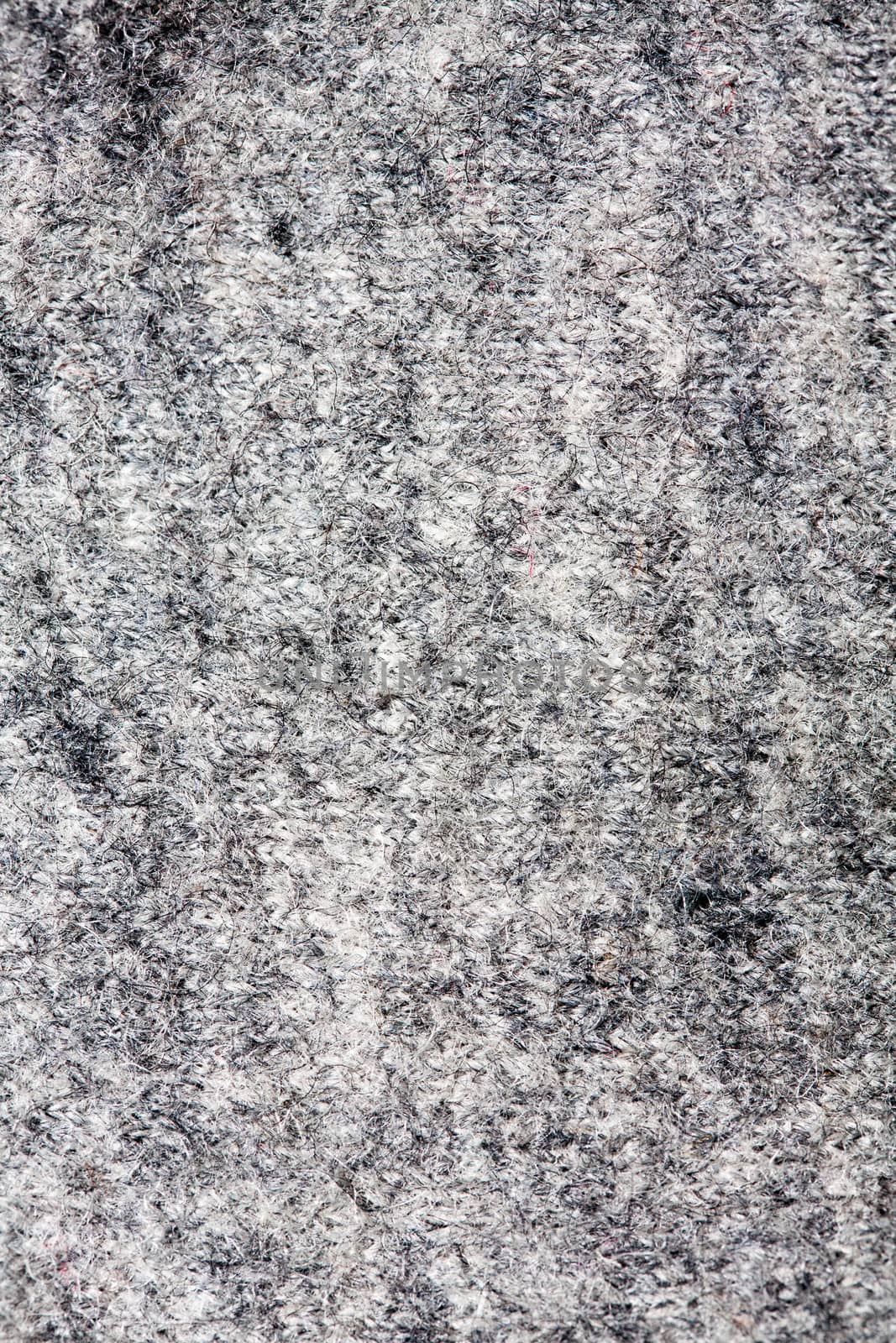 Seamless grey textile background with irregular pattern