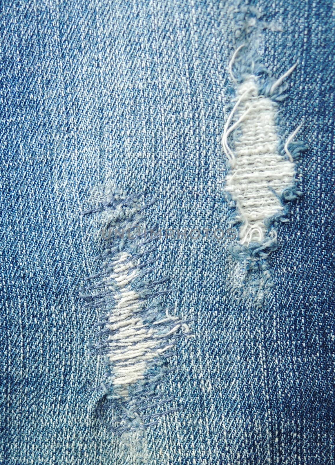 blue jean texture with a hole and threads showing by MalyDesigner