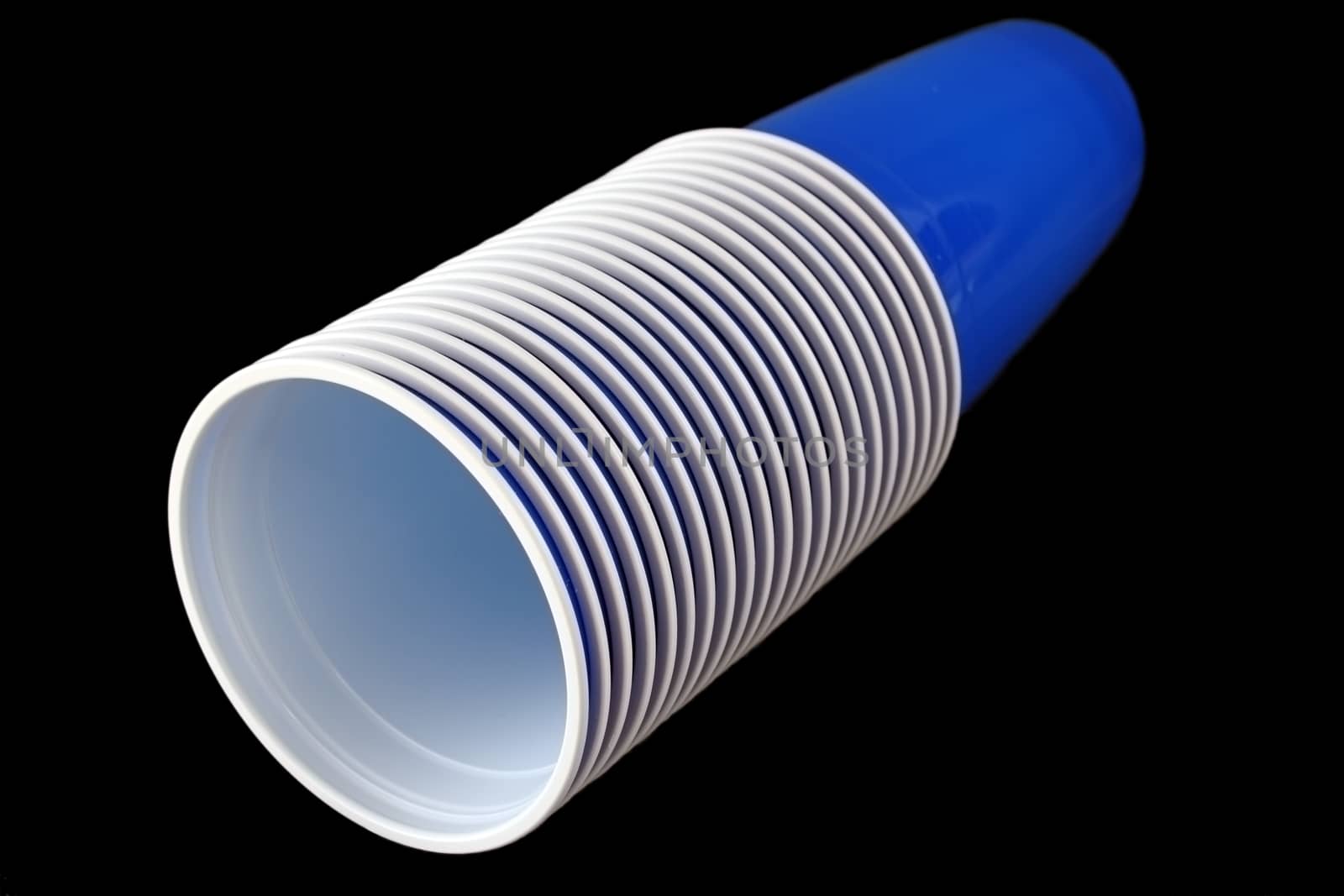 blue beer plastic cups isolated over dark background