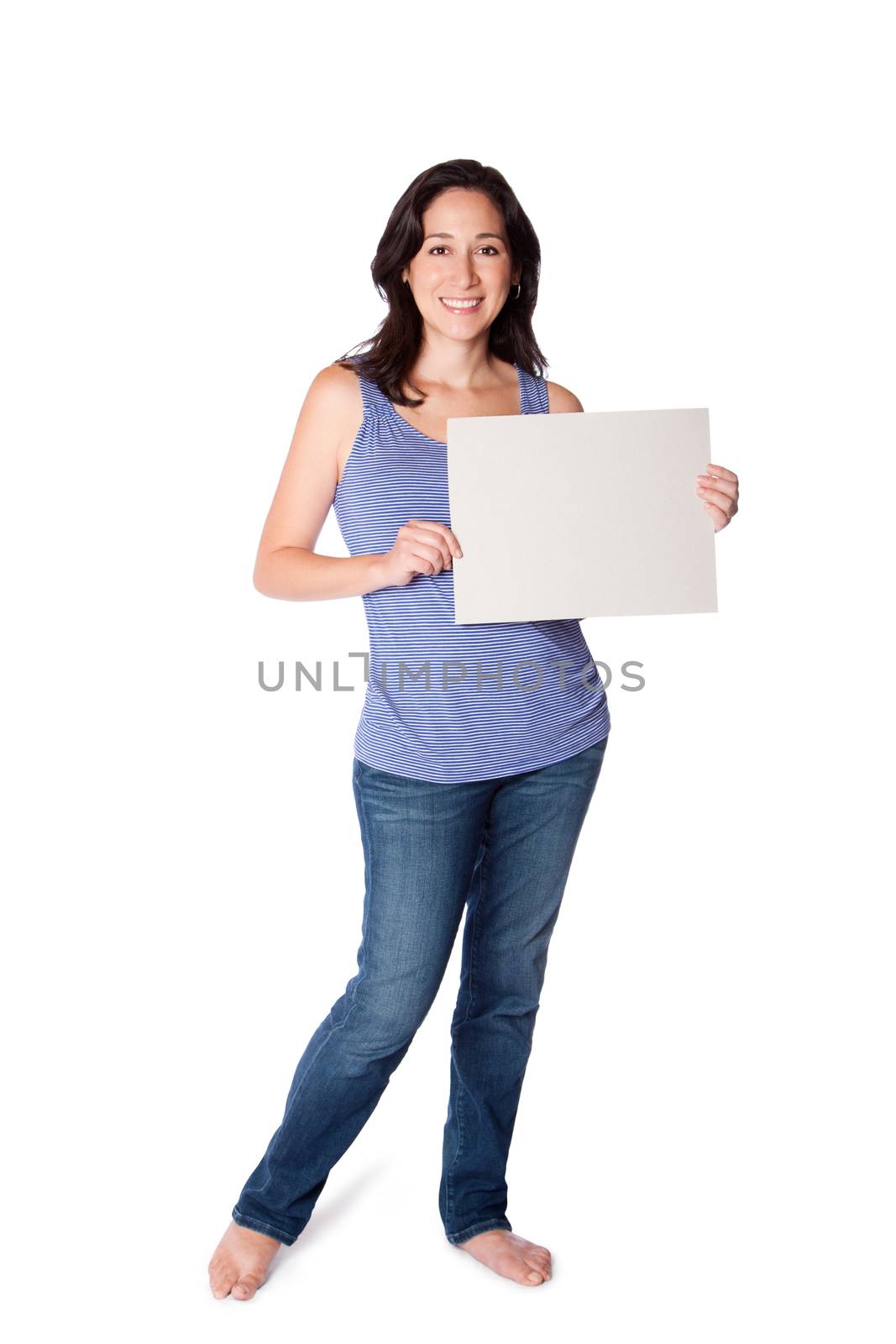 Happy smiling young woman standing holding whiteboard sign, isolated.
