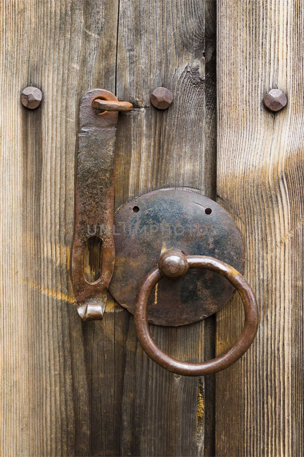 Door handle on an old wooden door