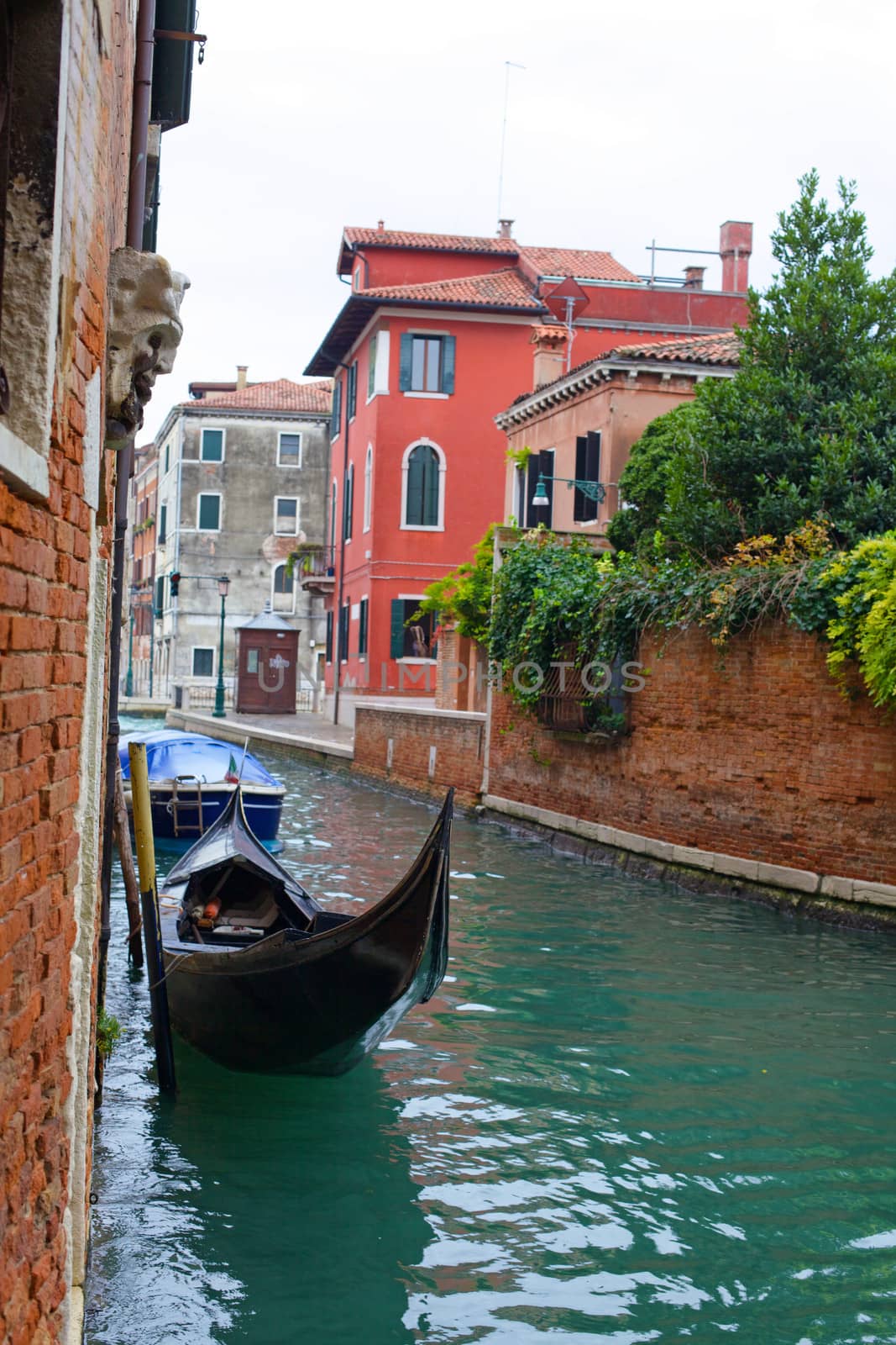 Beautiful romantic Venetian scenery. Street, canal, bridge. Venice. Italy