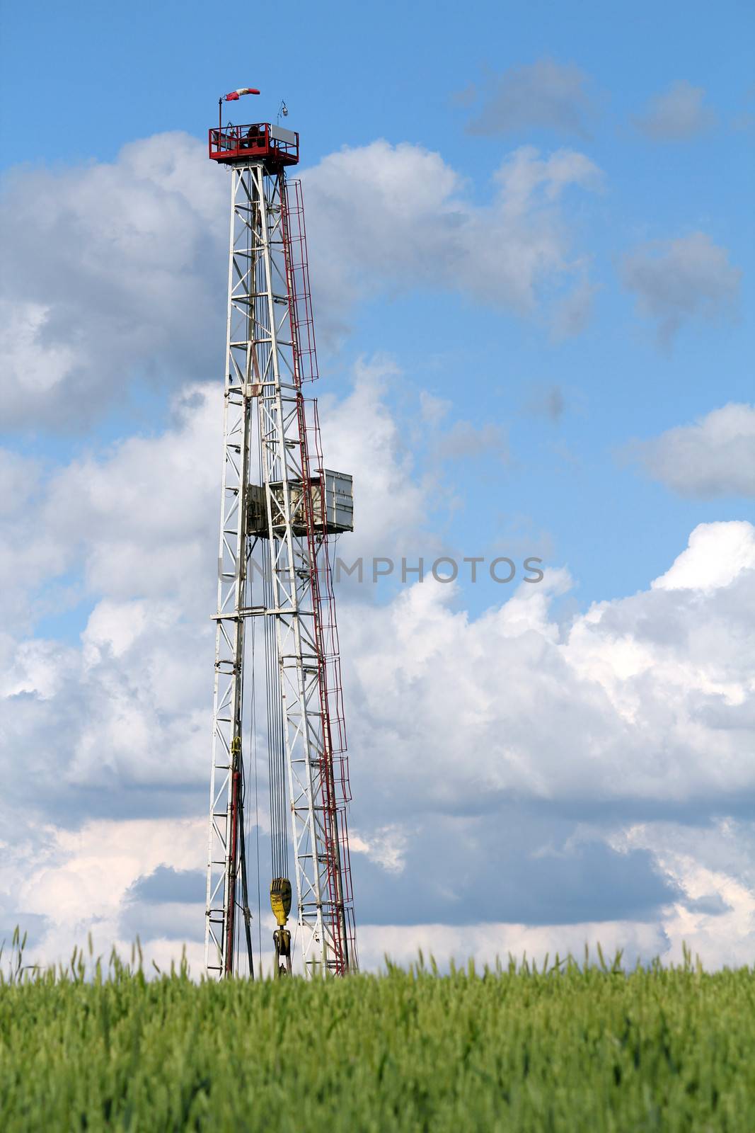 oil drilling rig and blue sky