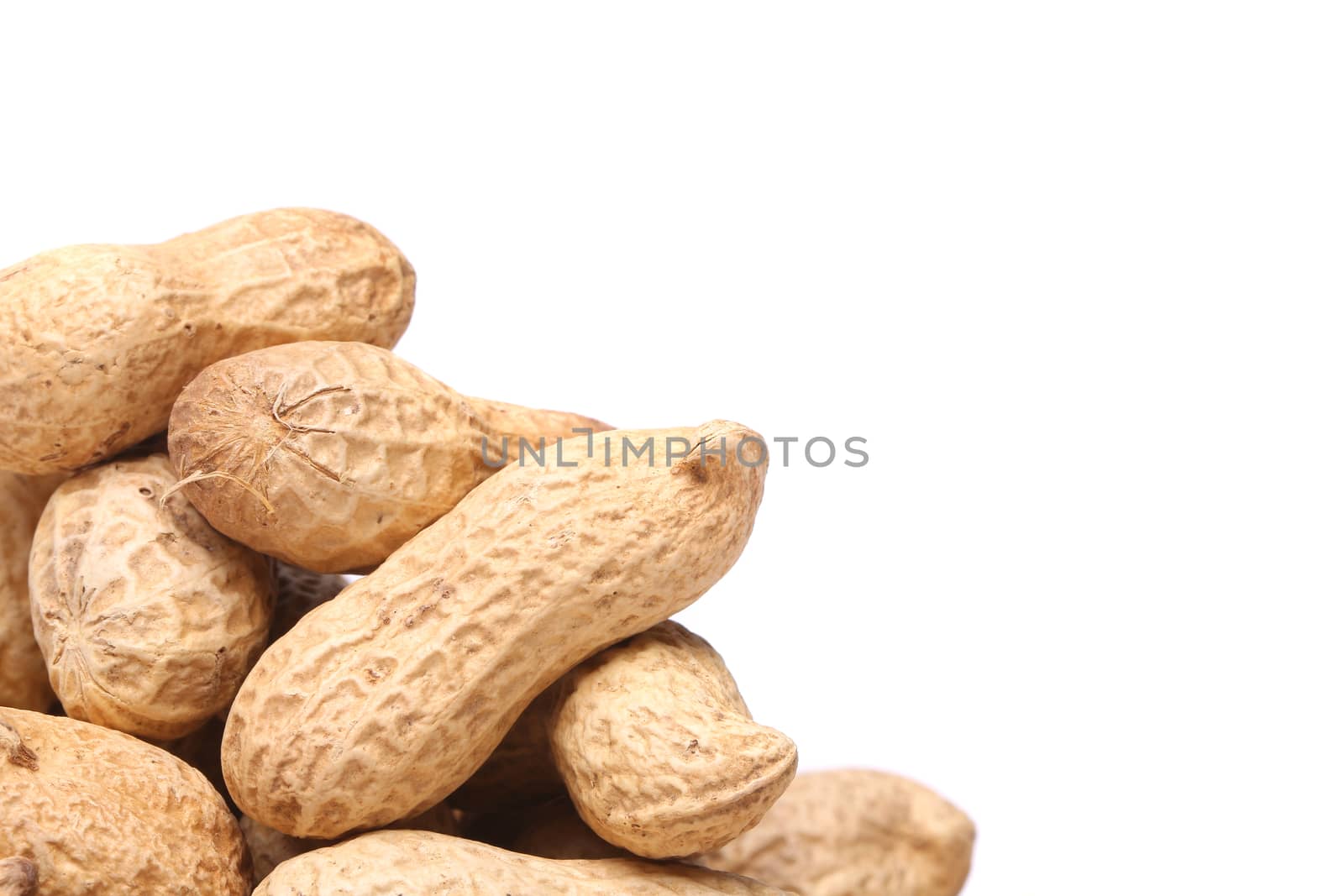 White background and peanuts left by indigolotos