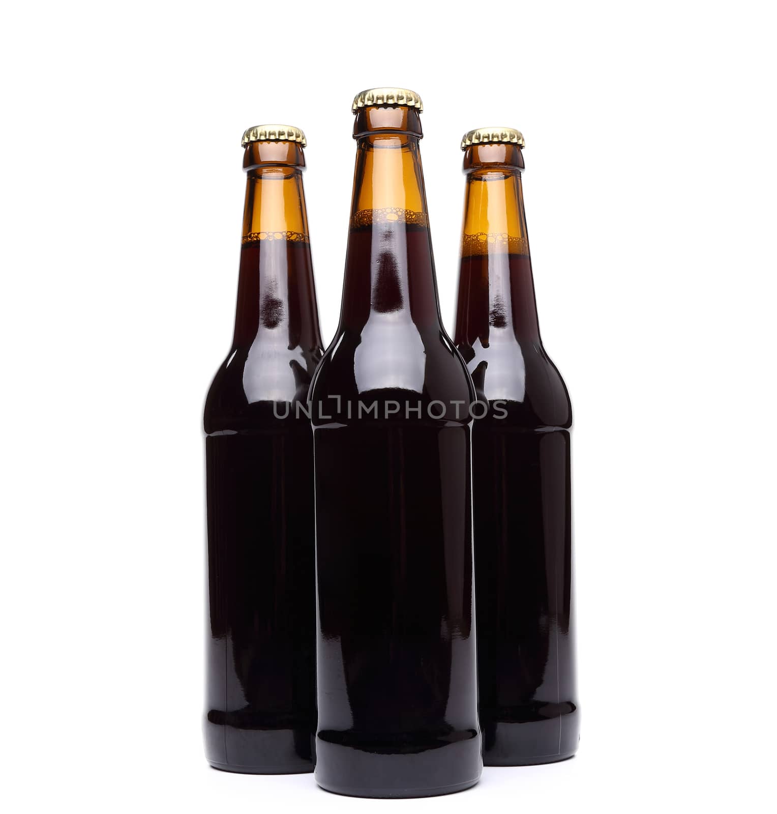 Three bottles of beer on white background.