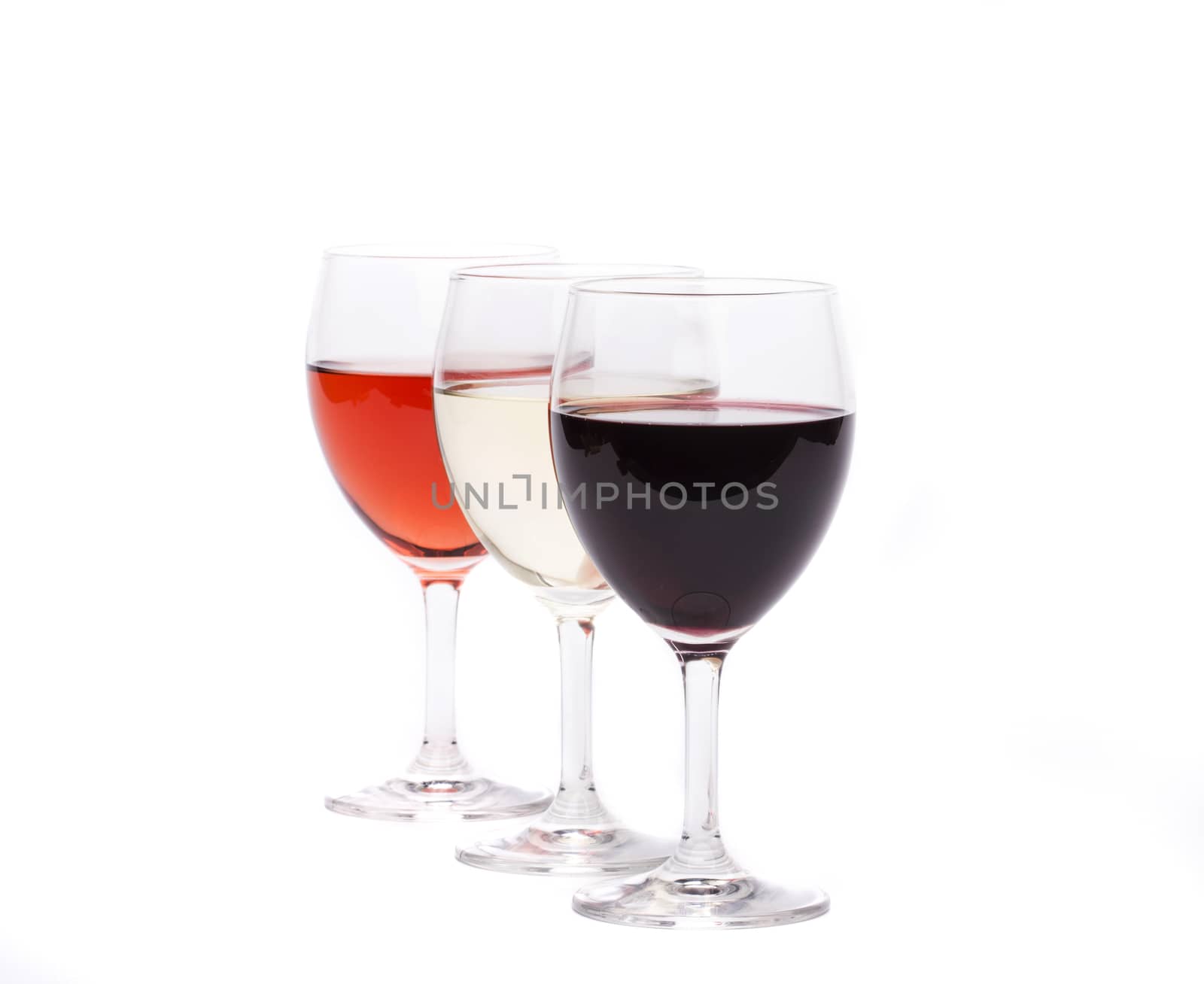 A set of three glasses of wine by indigolotos
