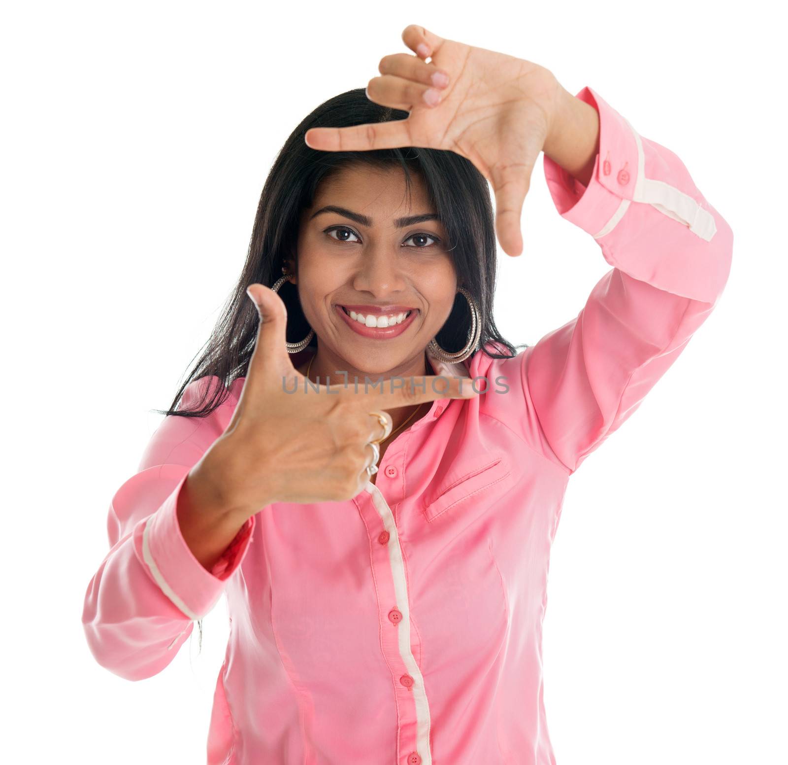 Finger frame. Smiling Indian woman making a frame with fingers, Asian female model isolated on white background.