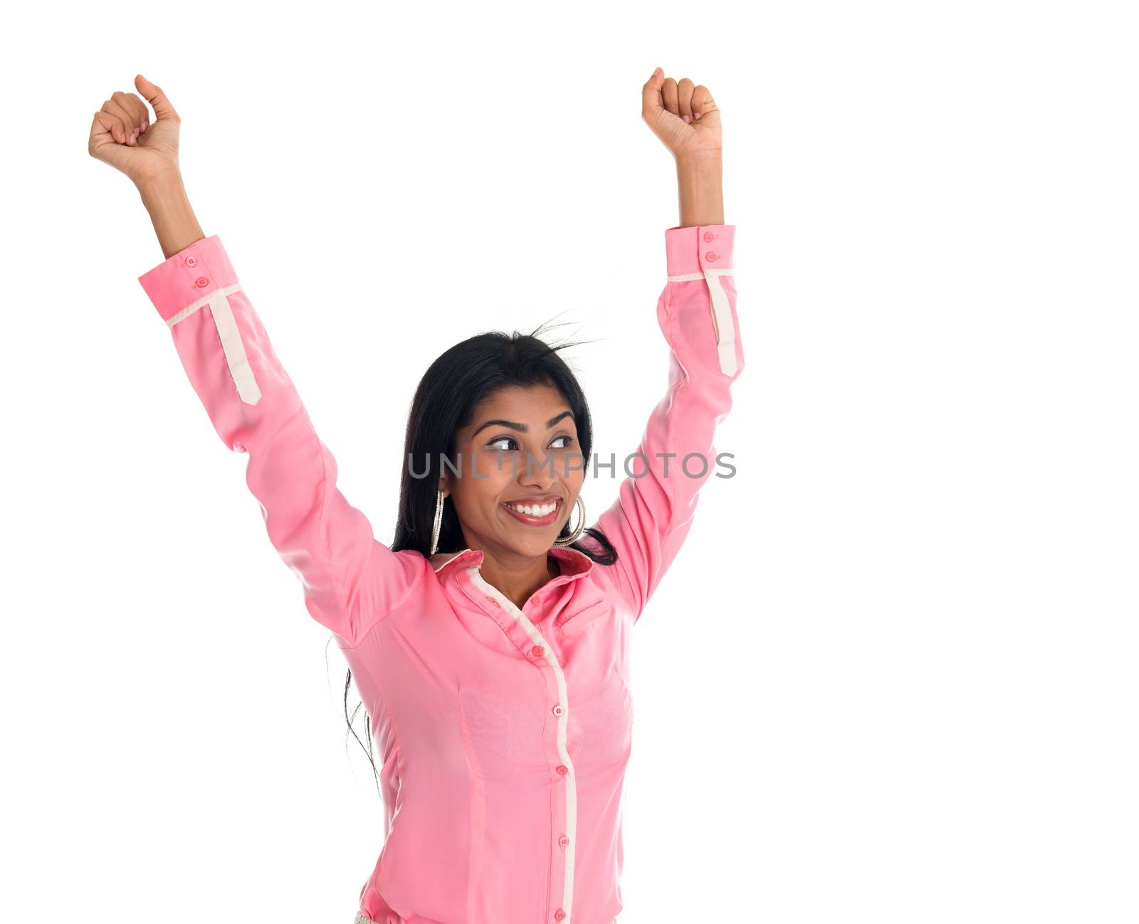 Excited Indian business woman arms up cheering by szefei