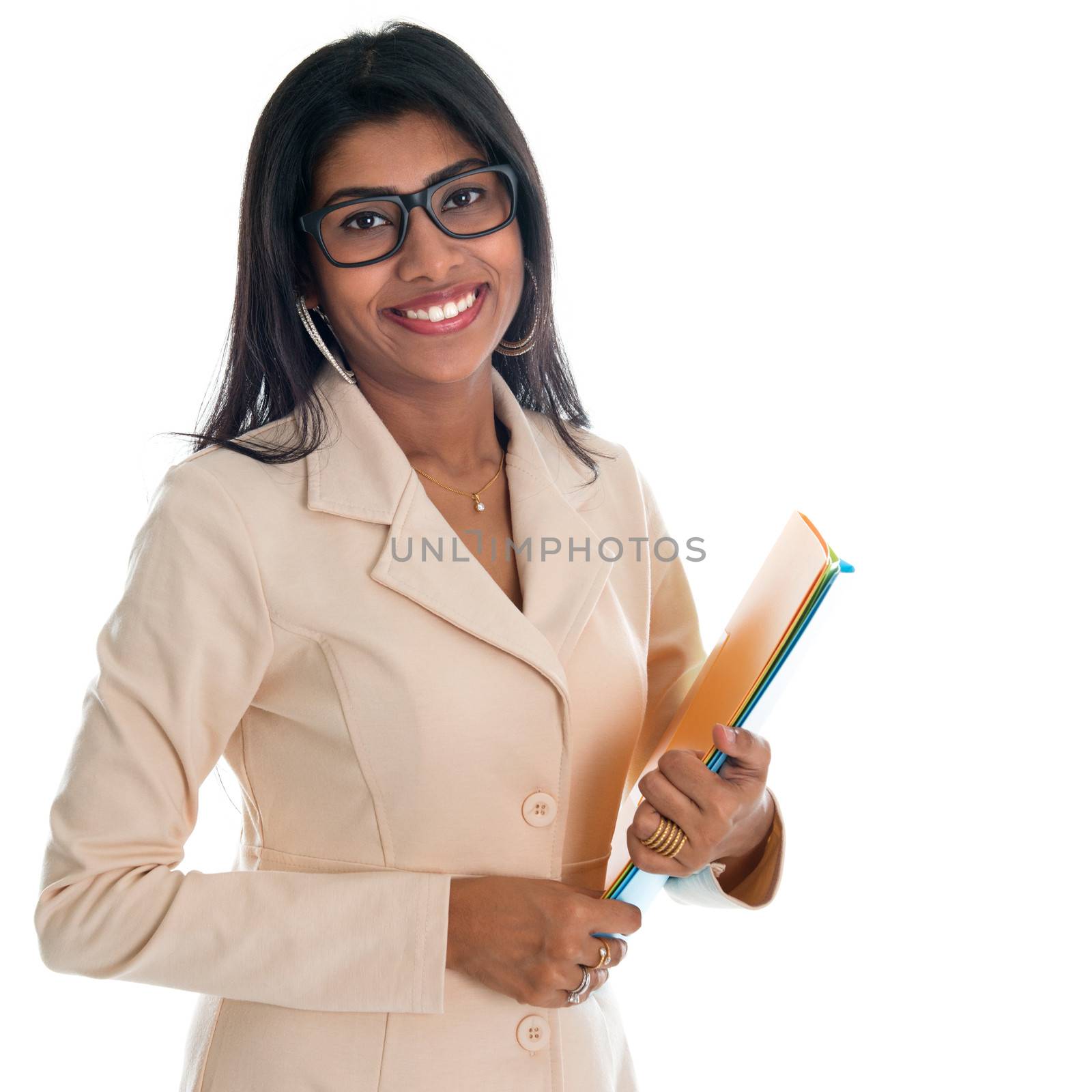 Indian businesswoman holding office file document. Portrait of beautiful Asian female model standing isolated on white background.