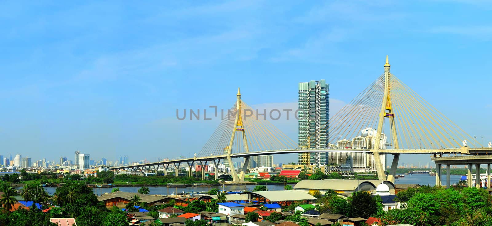 The Bhumibol Bridge also known as the Industrial Ring Road Bridge  is part of the 13 km long Industrial Ring Road connecting southern Bangkok with Samut Prakan Province