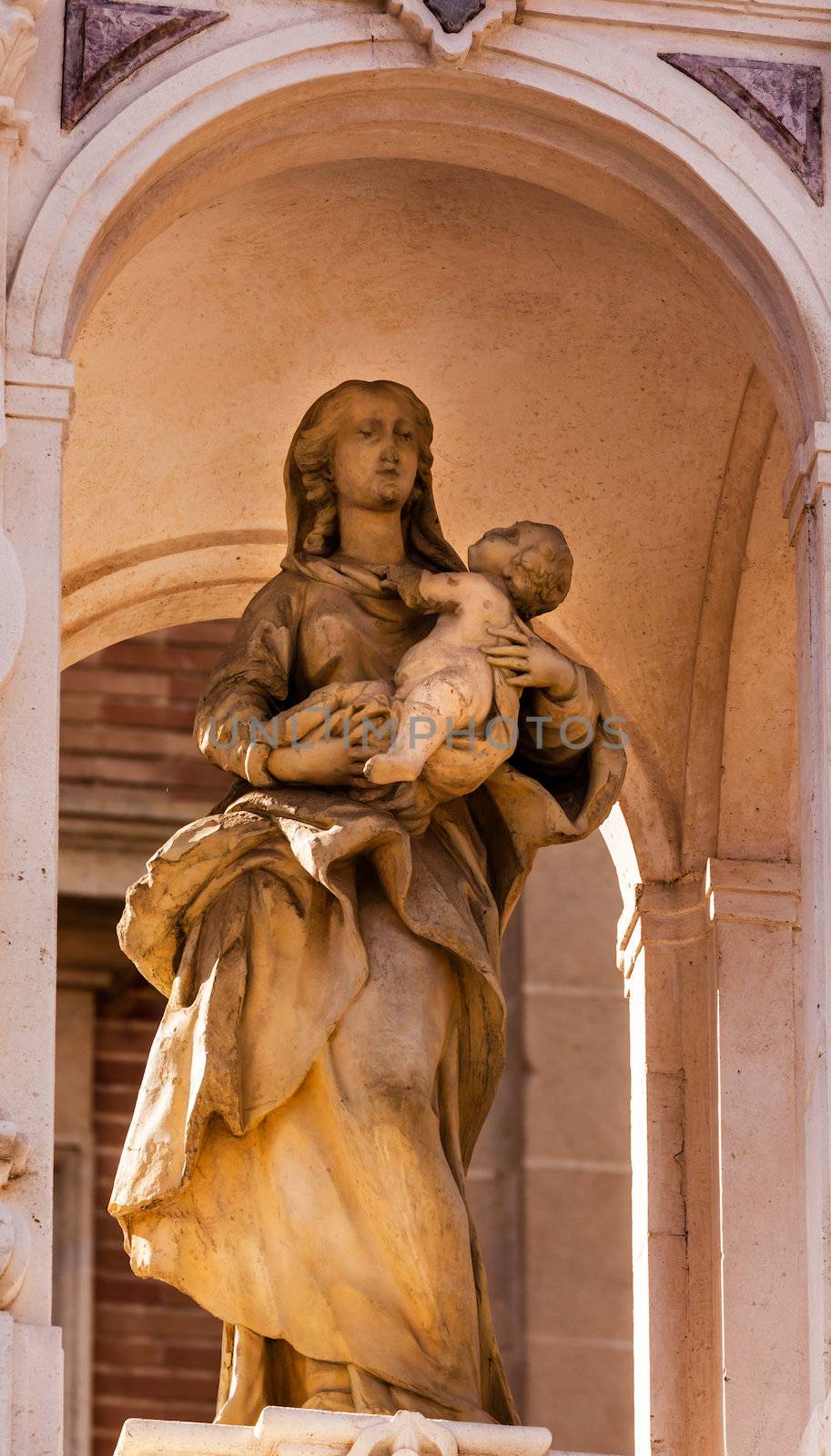 Mary Jesus Statue Outside Seville Cathedral, Cathedral of Saint Mary of the See, Seville, Andalusia Spain.  Built in the 1500s. 