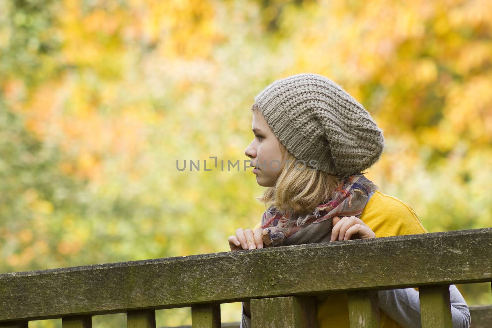 cute little girl in the autumn park by miradrozdowski