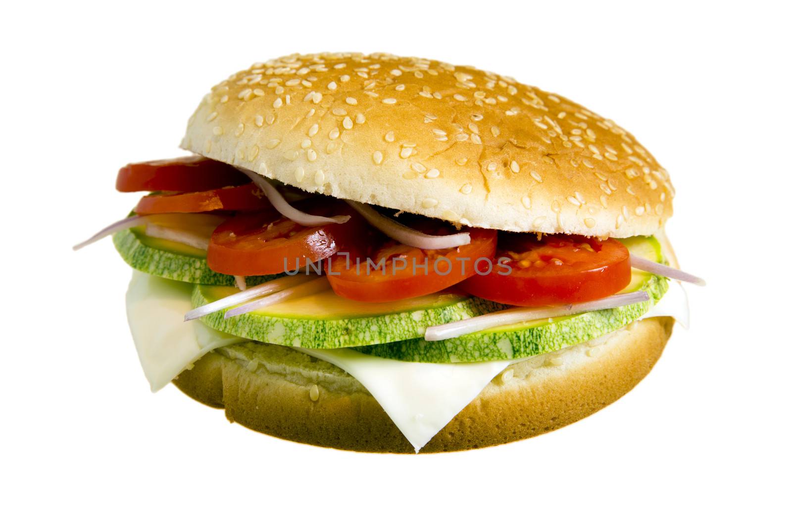 Veggie burger made with zucchini, tomatoes, onion and cheese isolated on white background