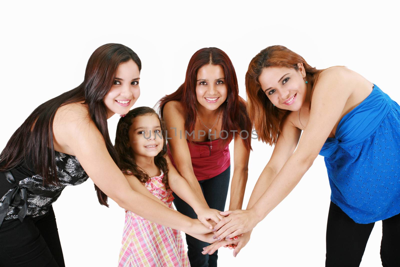 Group of young people with hands together - family concepts by dacasdo